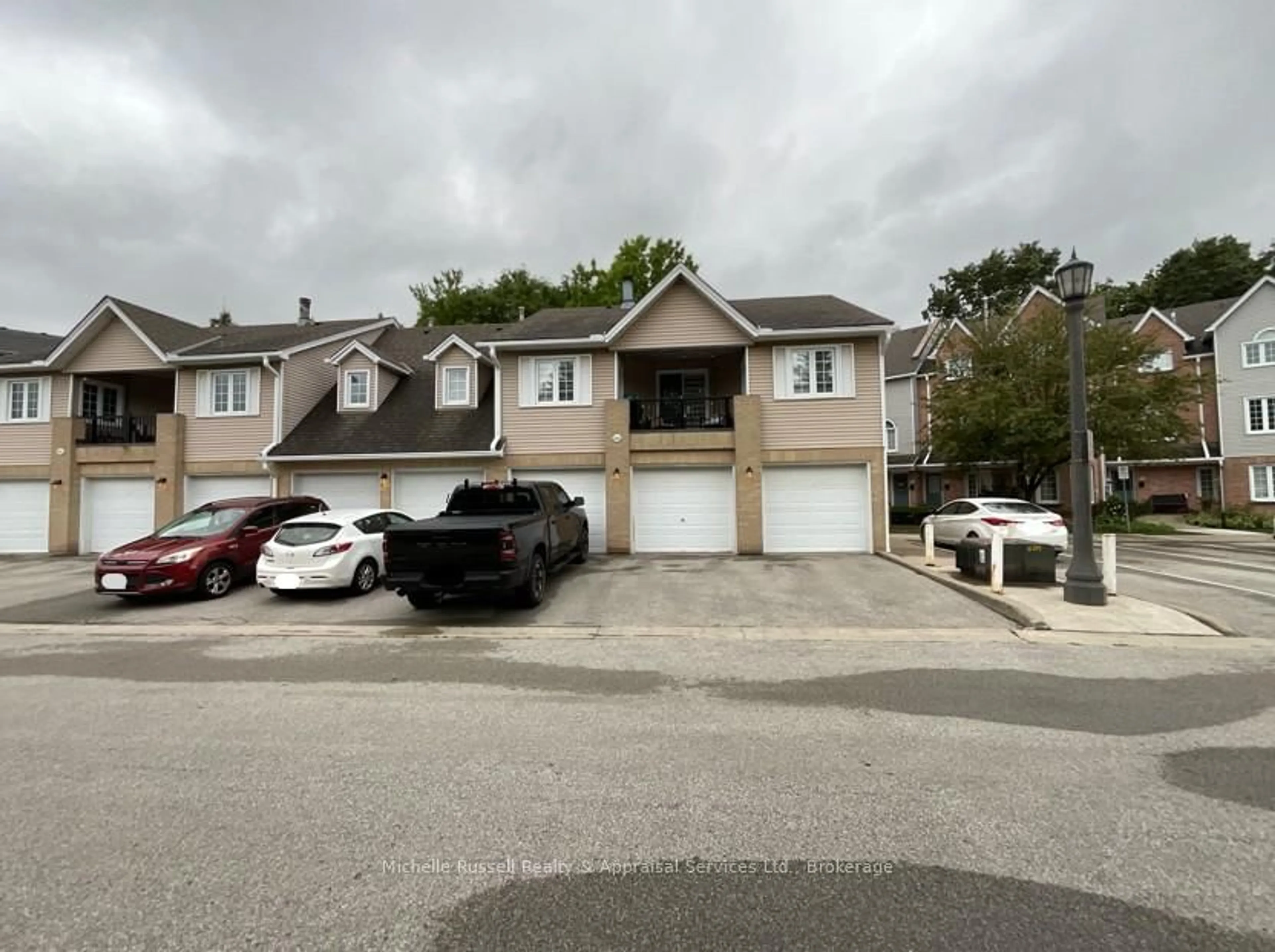 A pic from outside/outdoor area/front of a property/back of a property/a pic from drone, street for 2110 Cleaver Ave #244, Burlington Ontario L7M 3Z3