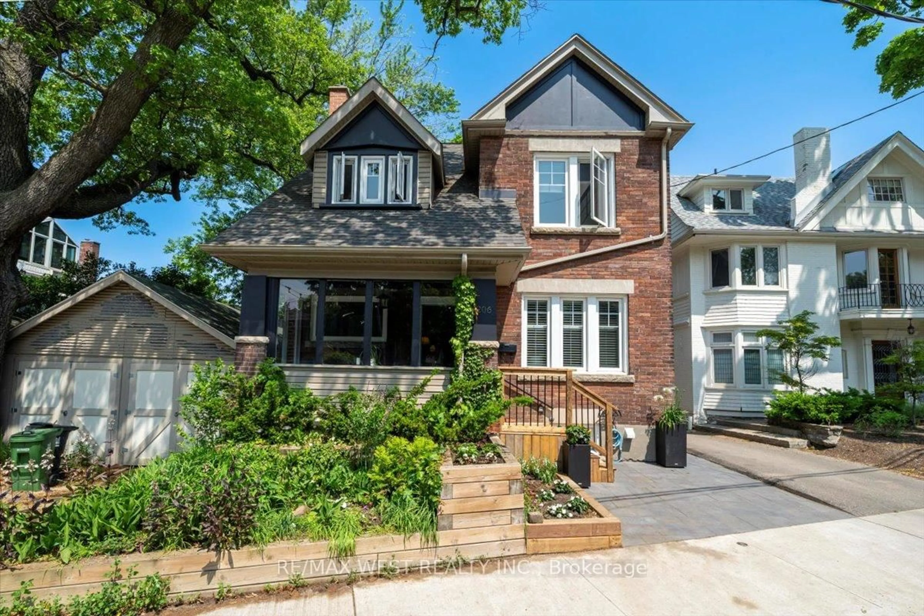 Home with brick exterior material, street for 206 Howard Park Ave, Toronto Ontario M6R 1W1