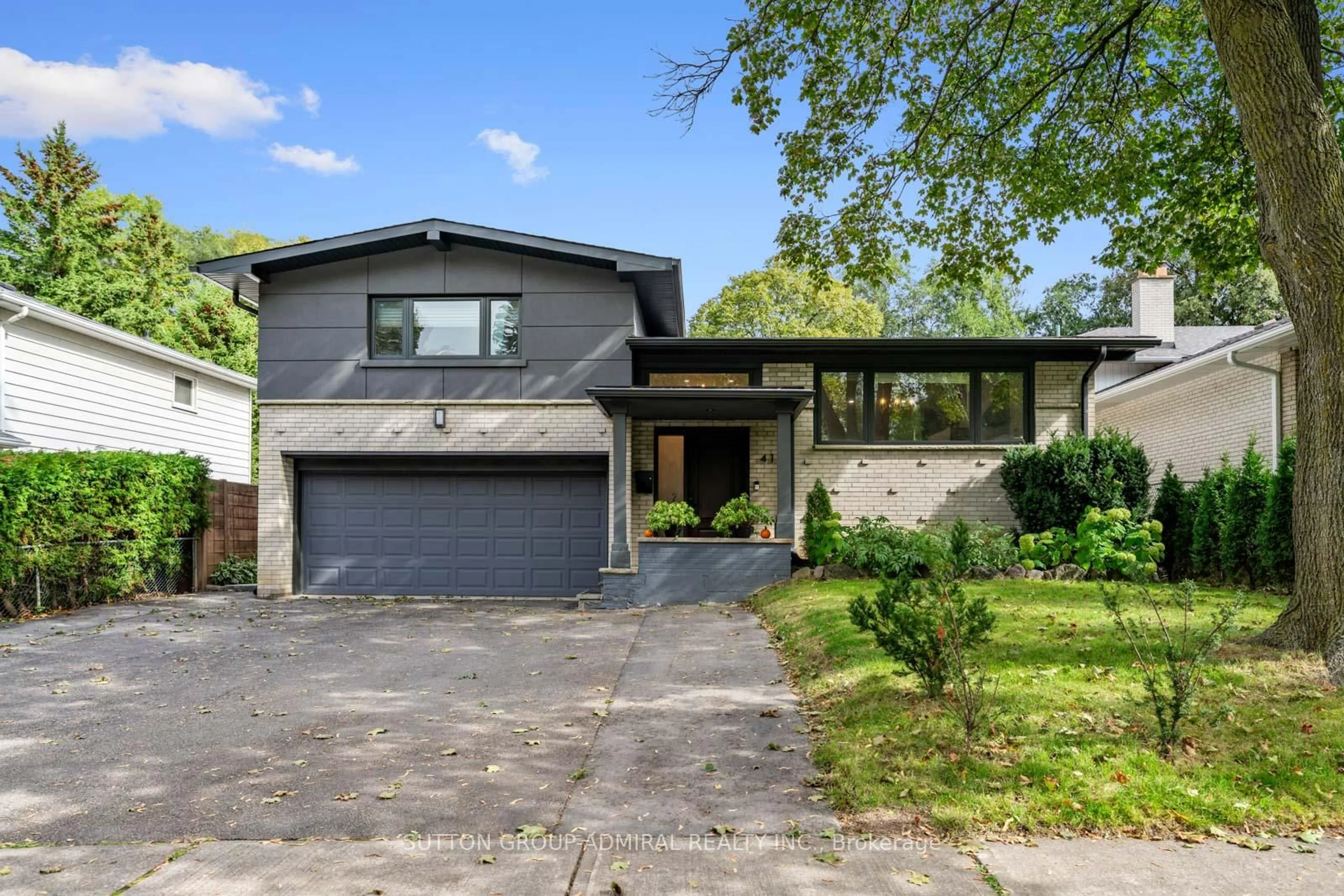 Home with brick exterior material, street for 41 Waterford Dr, Toronto Ontario M9R 2N5