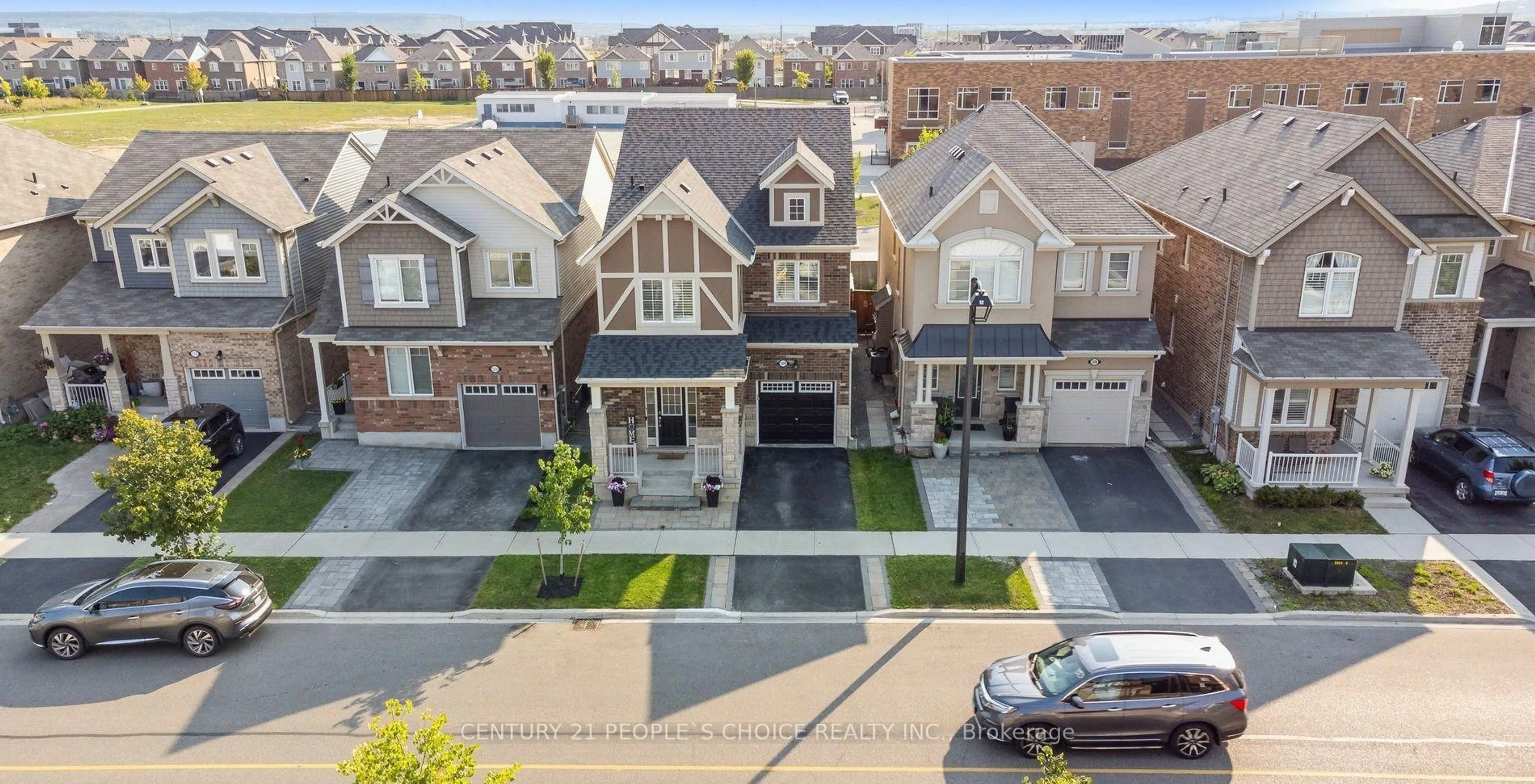 A pic from outside/outdoor area/front of a property/back of a property/a pic from drone, street for 1308 Leger Way, Milton Ontario L9E 1C9