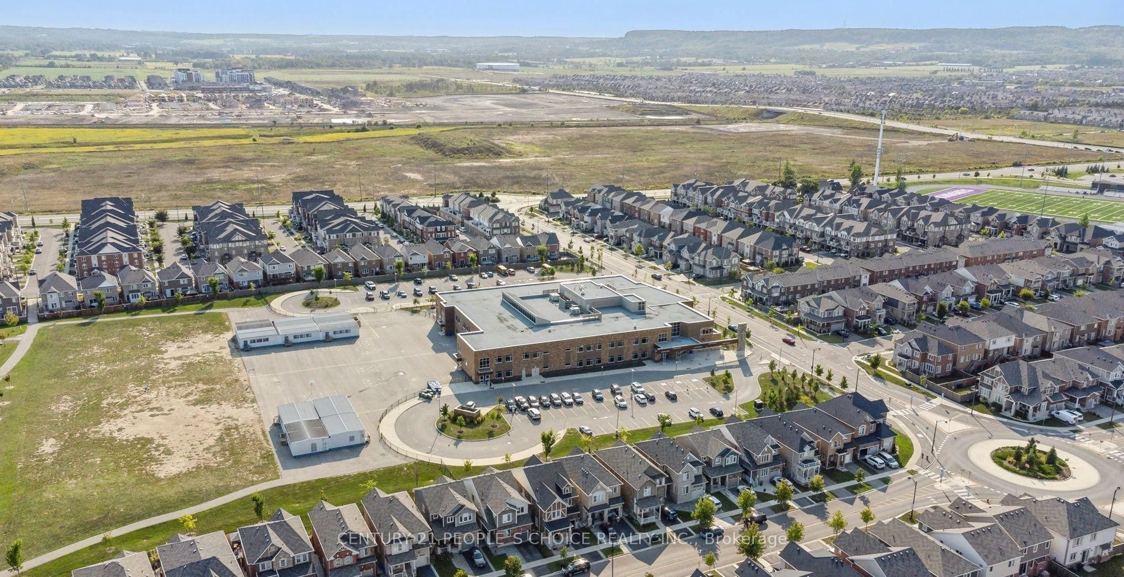 A pic from outside/outdoor area/front of a property/back of a property/a pic from drone, unknown for 1308 Leger Way, Milton Ontario L9E 1C9