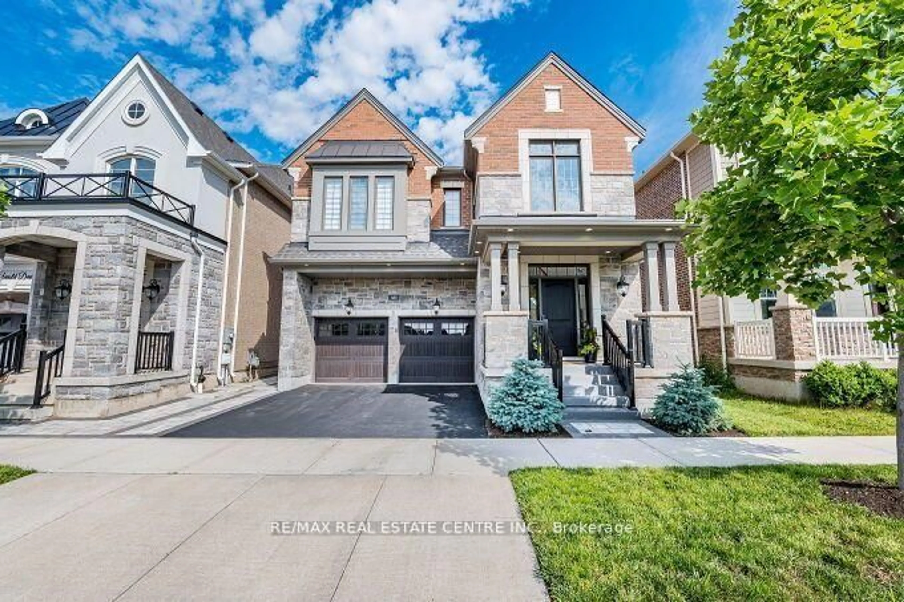 Home with brick exterior material, street for 323 Harold Dent Tr, Oakville Ontario L6M 1R3
