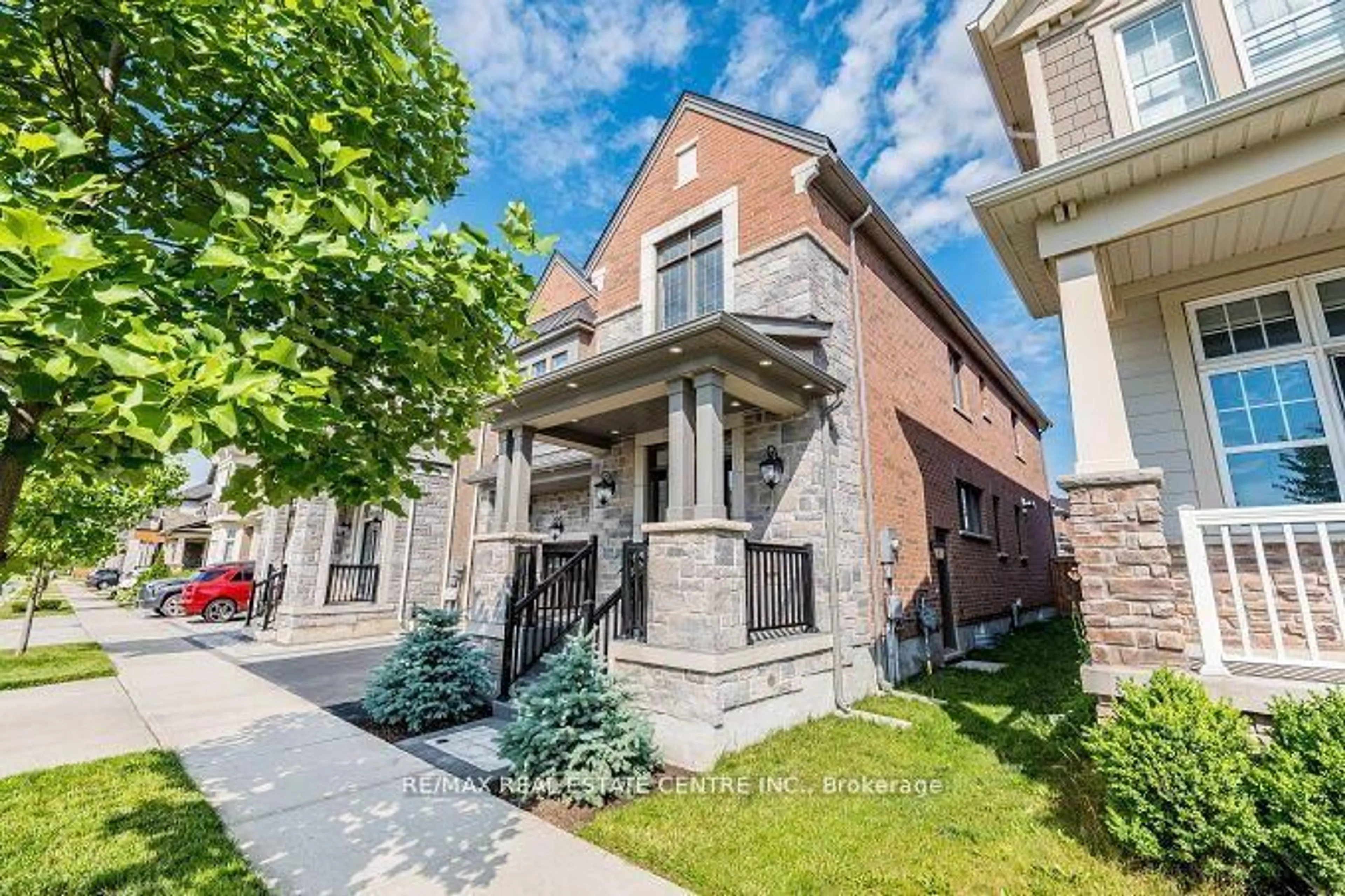 Home with brick exterior material, street for 323 Harold Dent Tr, Oakville Ontario L6M 1R3