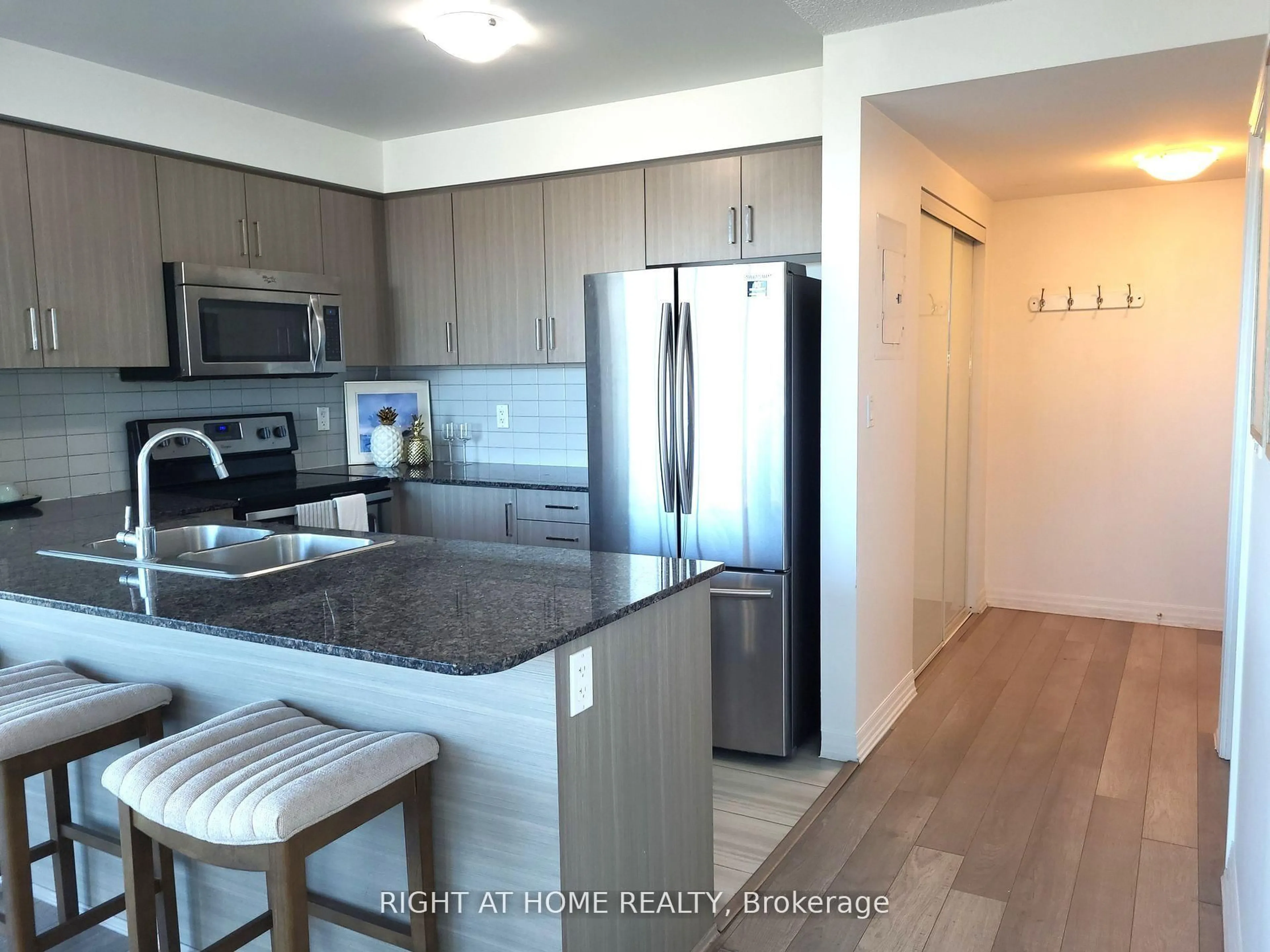 Open concept kitchen, unknown for 80 Esther Lorrie Dr #906, Toronto Ontario M9W 0C6