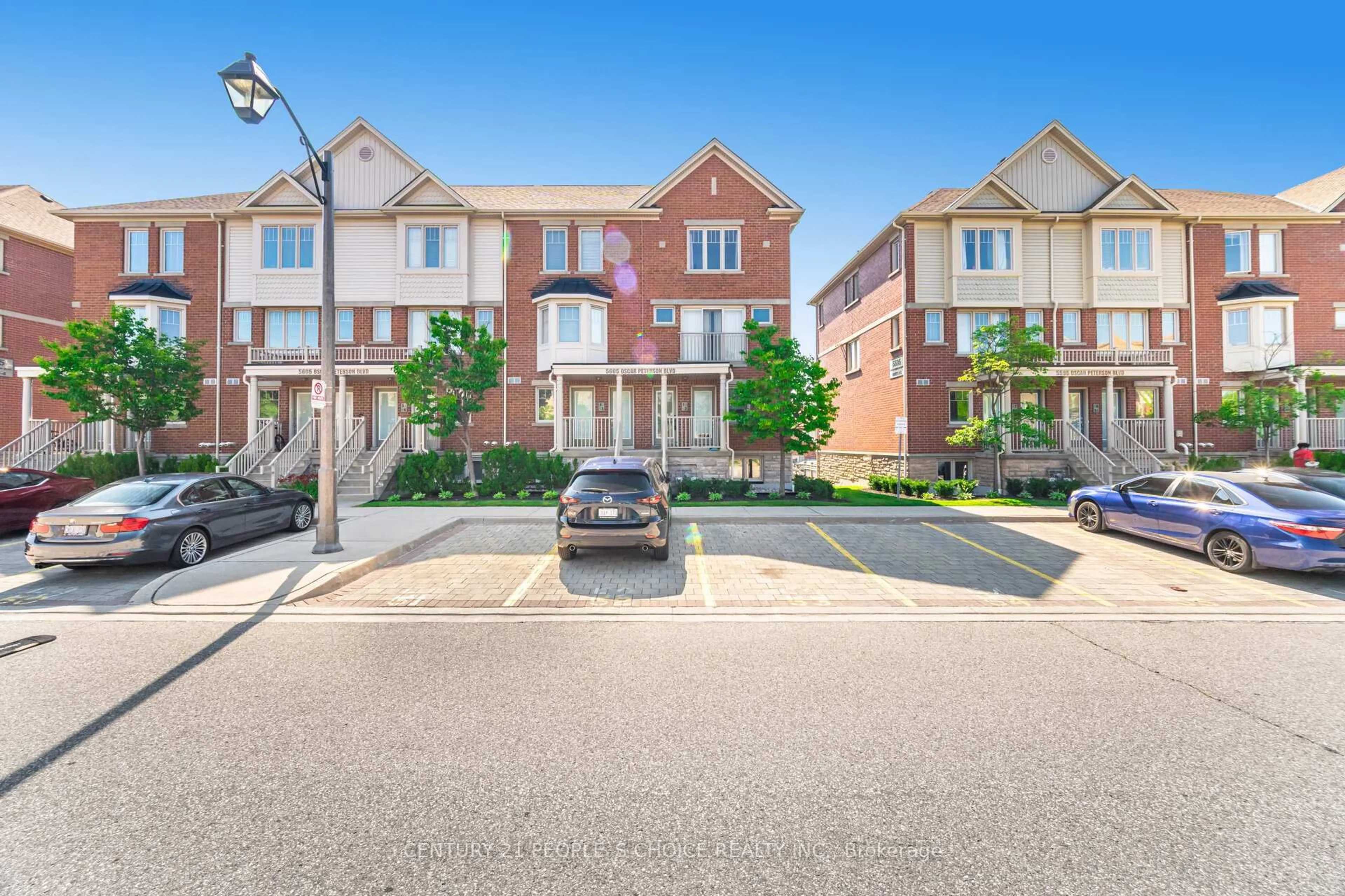 A pic from outside/outdoor area/front of a property/back of a property/a pic from drone, street for 5605 Oscar Peterson Blvd #2, Mississauga Ontario L5M 0T2