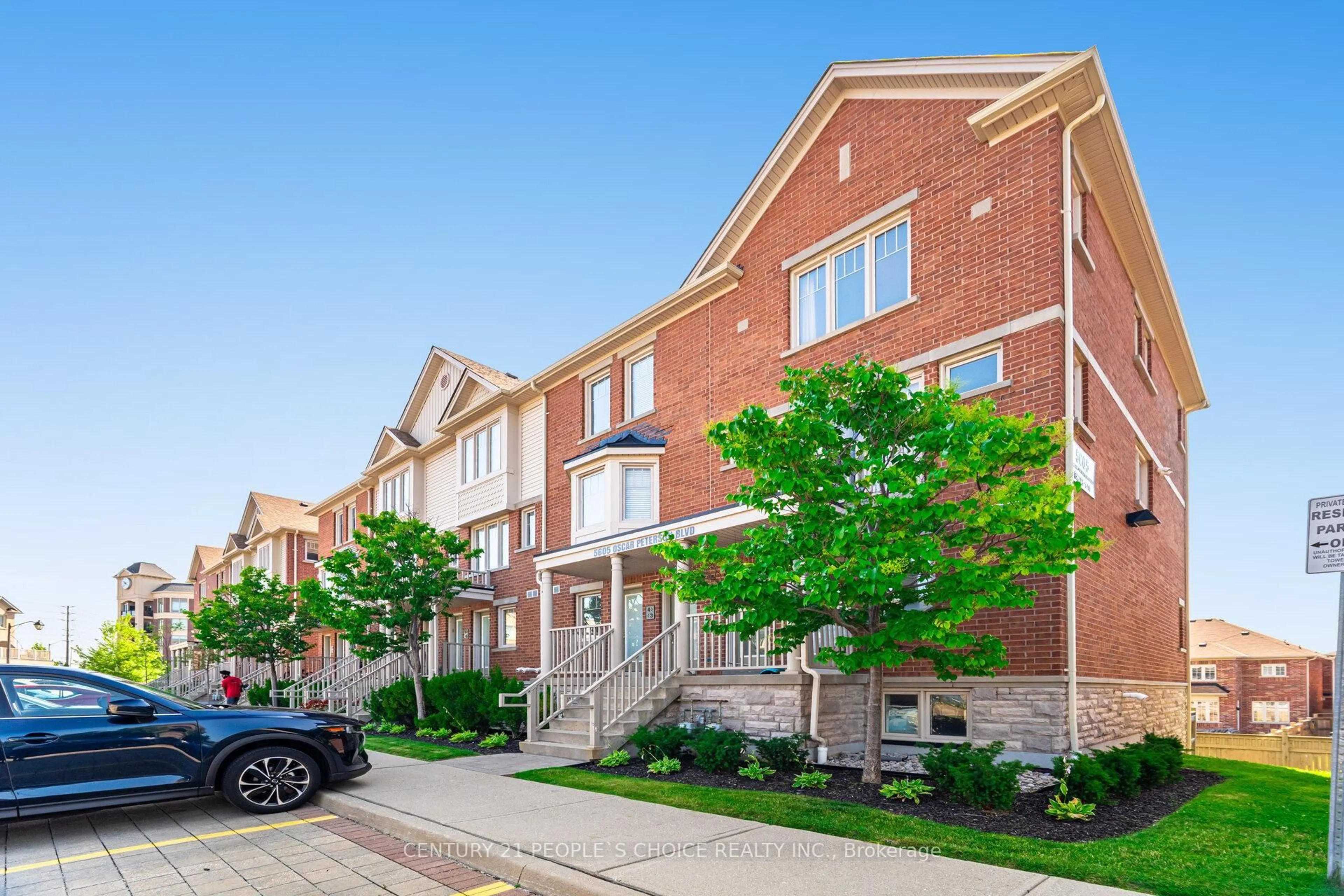 Home with brick exterior material, street for 5605 Oscar Peterson Blvd #2, Mississauga Ontario L5M 0T2