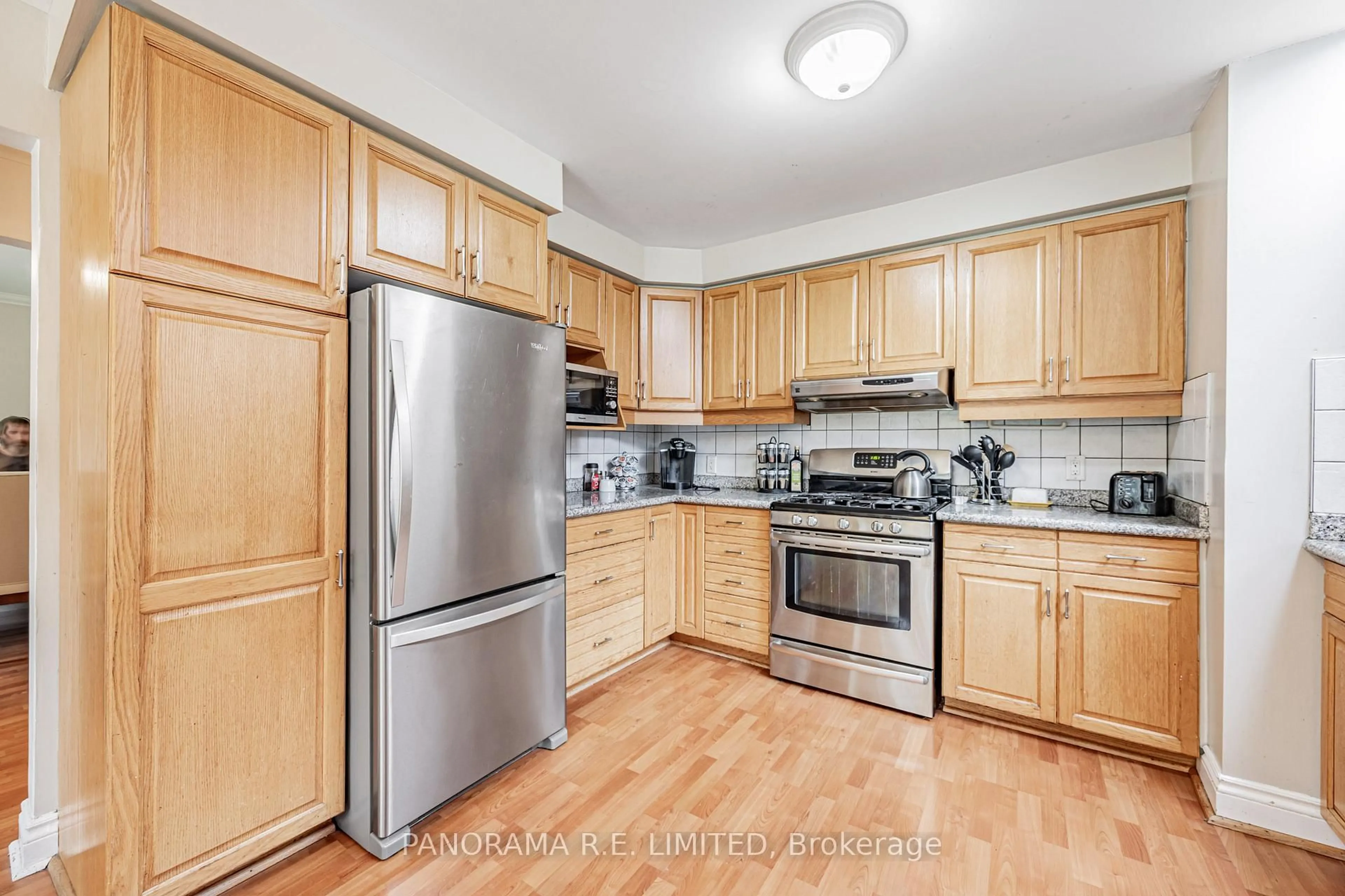 Standard kitchen, wood/laminate floor for 30 Cowley Ave, Toronto Ontario M9B 2E3