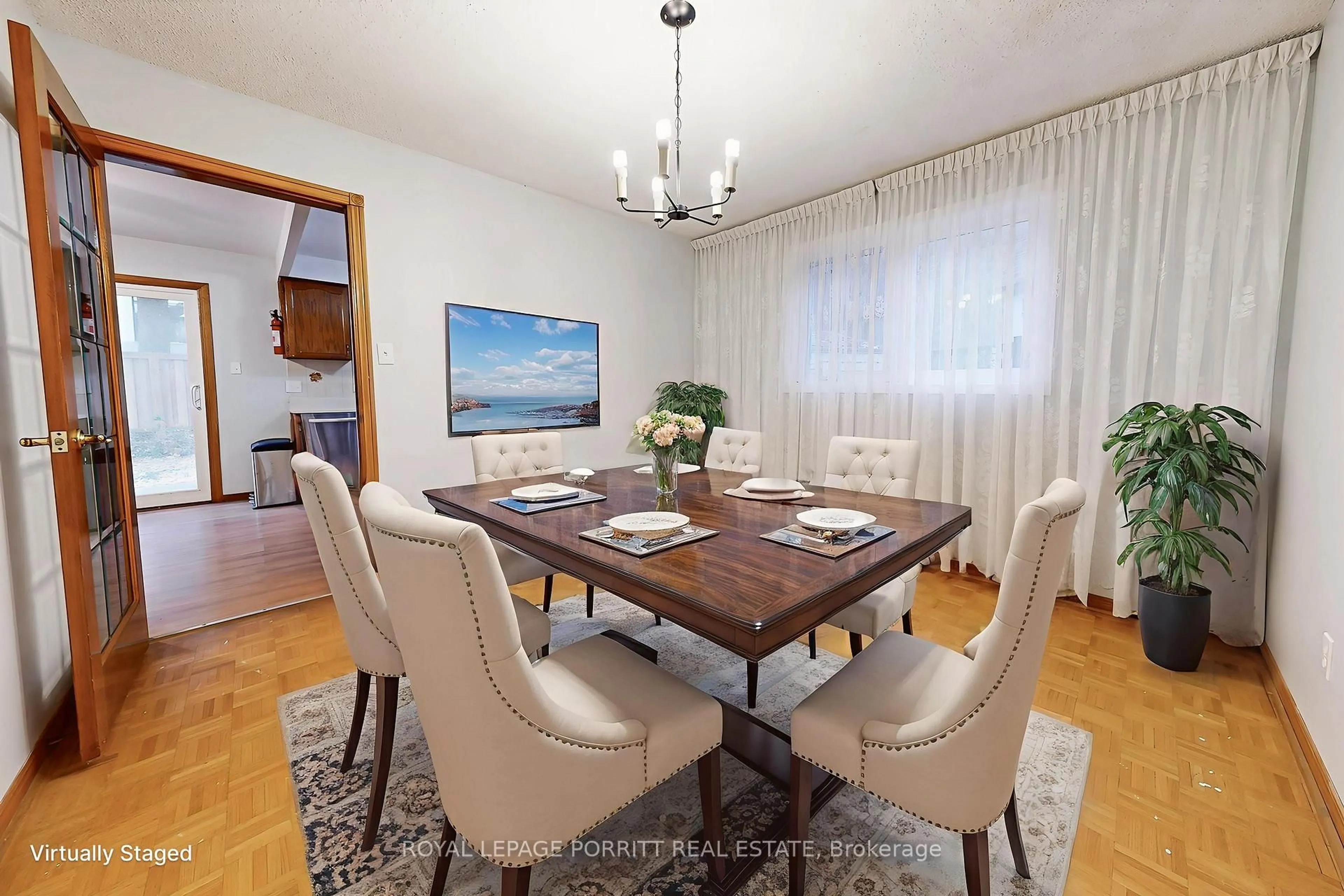 Dining room, wood/laminate floor for 11 Goa Crt, Toronto Ontario M8W 4Y2