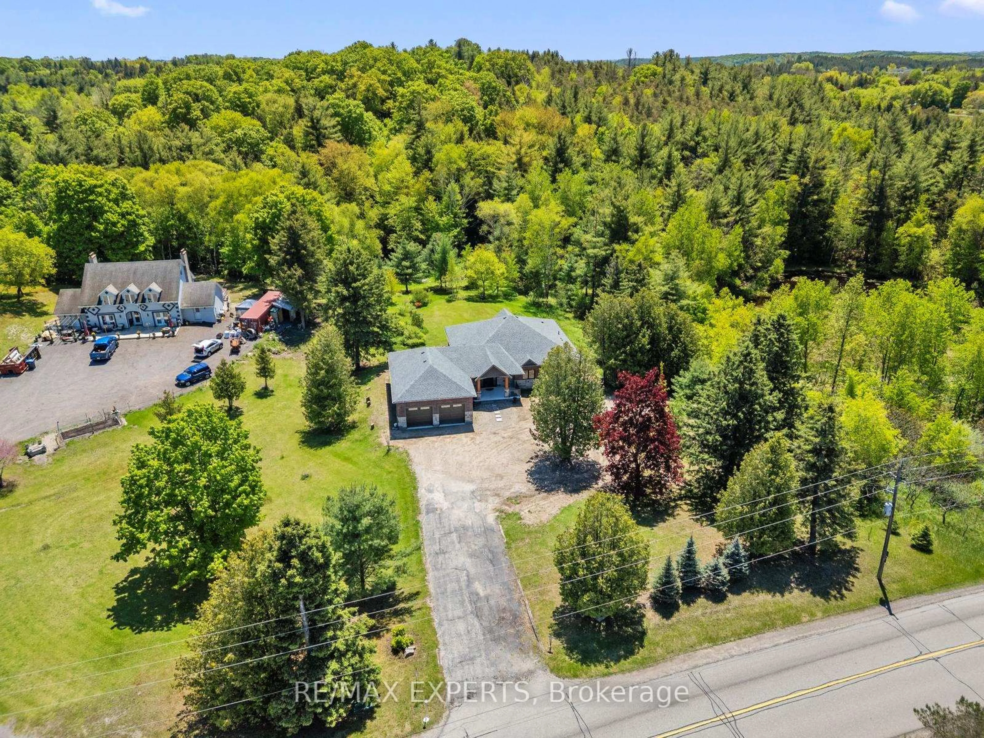 A pic from outside/outdoor area/front of a property/back of a property/a pic from drone, forest/trees view for 211 Pine Ave, Caledon Ontario L7E 3S7