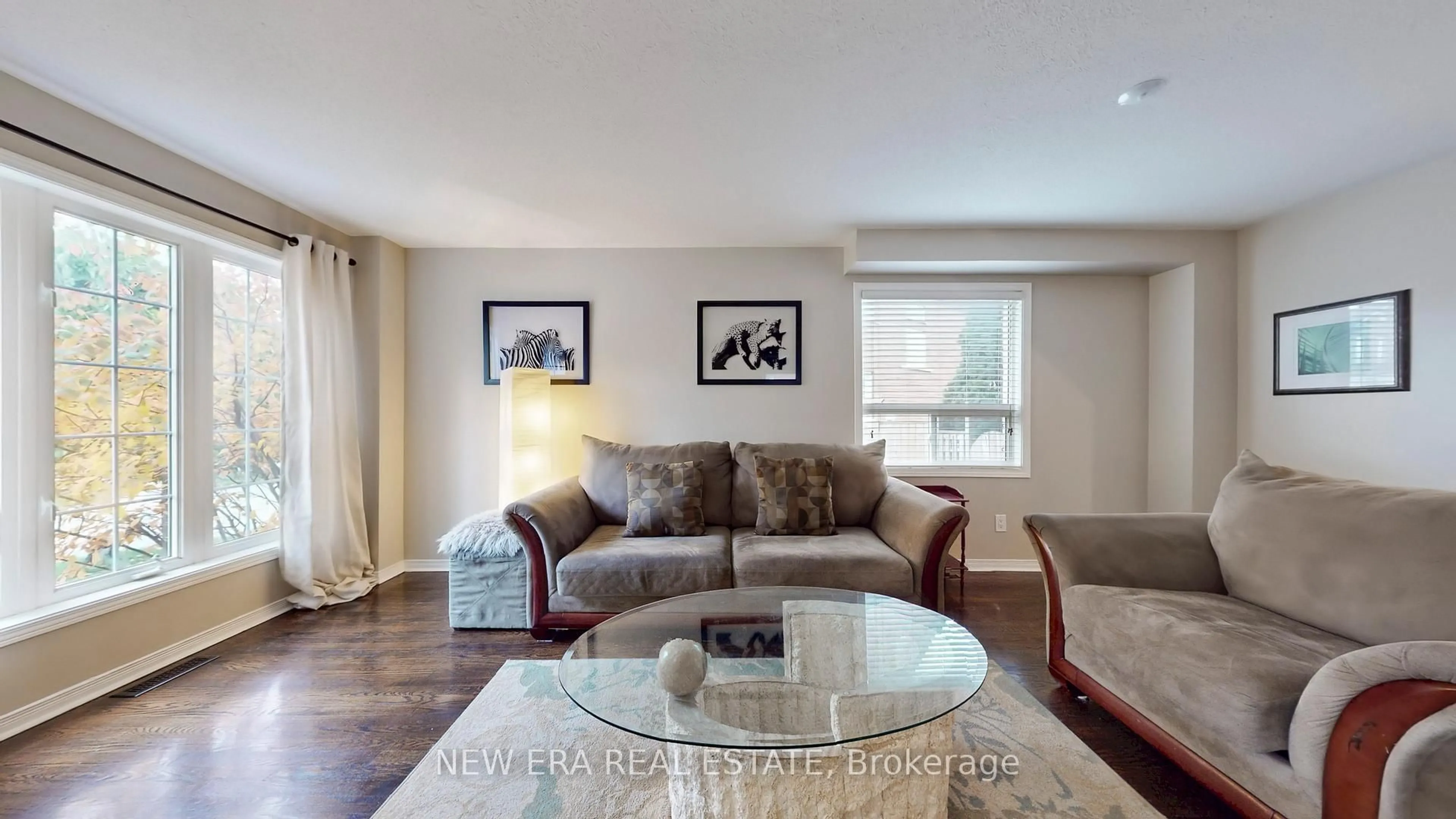 Living room with furniture, wood/laminate floor for 496 Delphine Dr, Burlington Ontario L7L 6W8