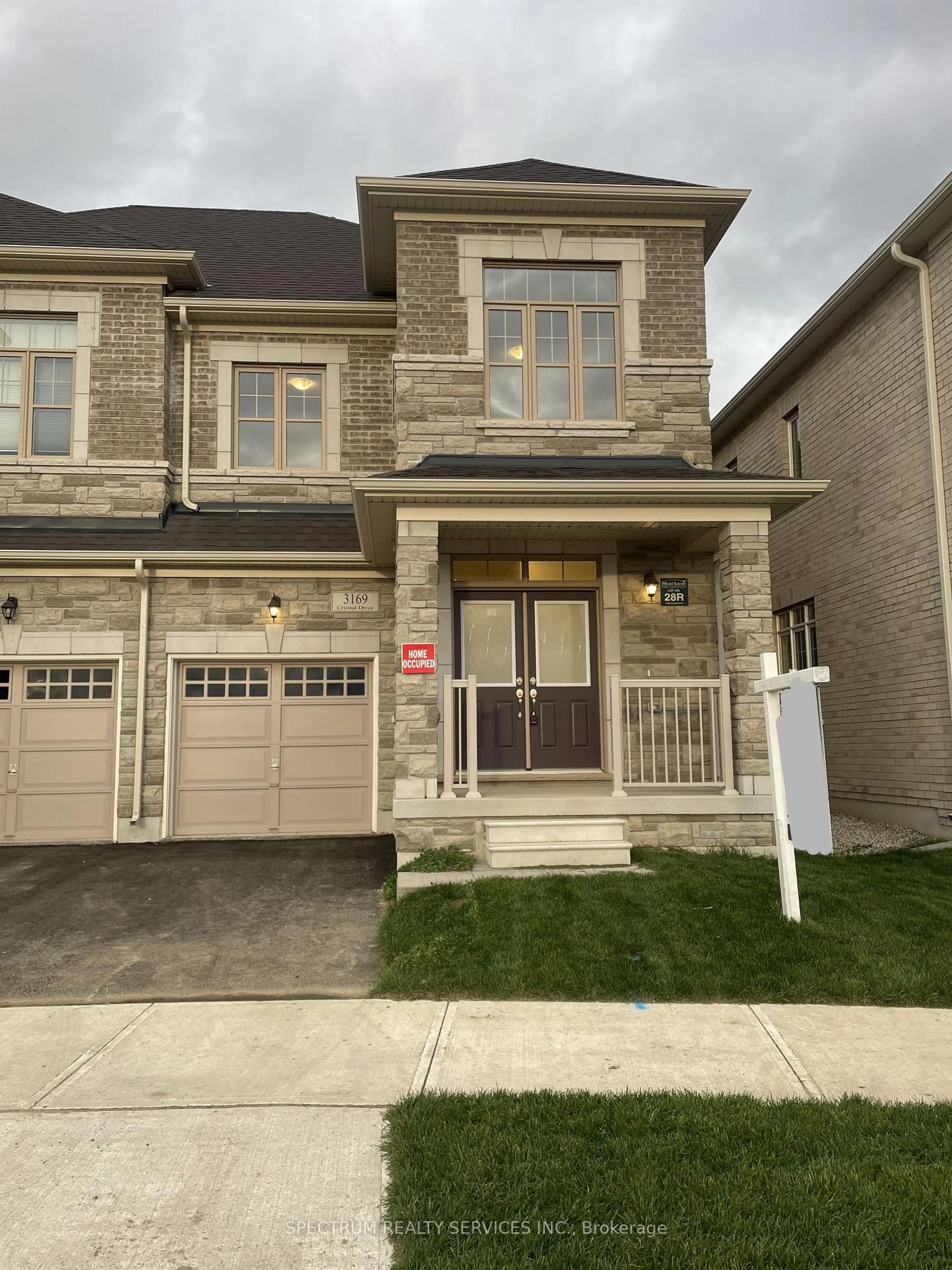 Home with brick exterior material, street for 3169 Crystal Dr #28R, Oakville Ontario L6M 0W8