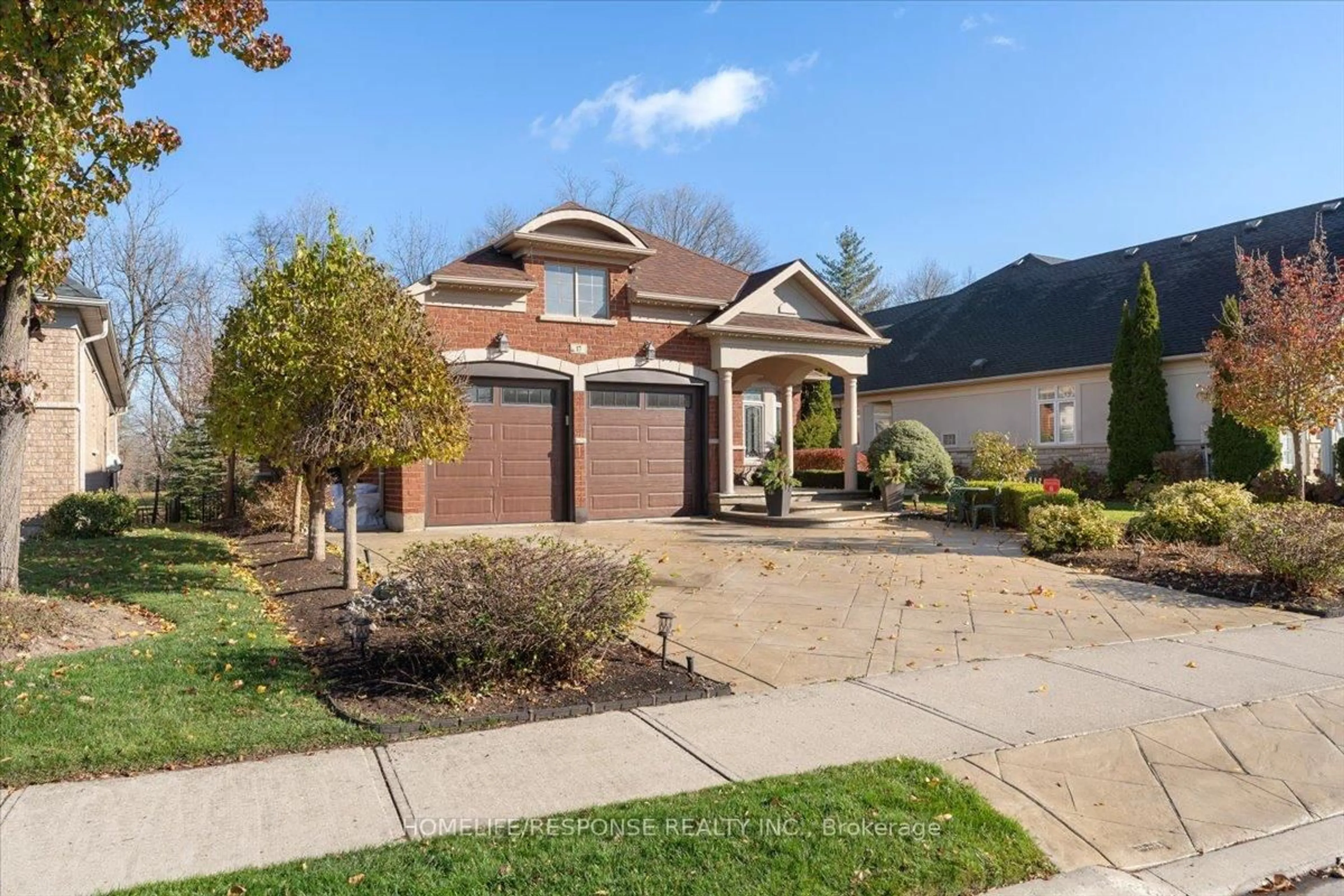 Home with brick exterior material, street for 17 Mcnutt St, Brampton Ontario L6Y 5L3