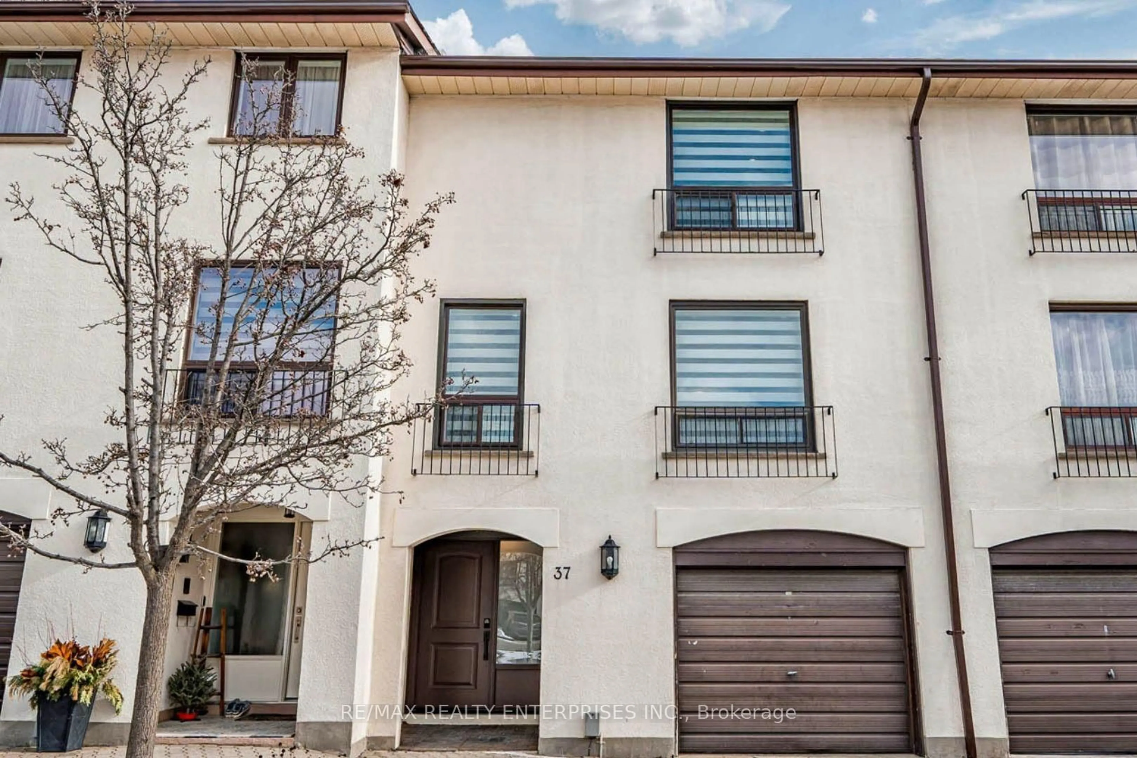 Home with brick exterior material, street for 6679 Shelter Bay Rd #37, Mississauga Ontario L5N 2A2