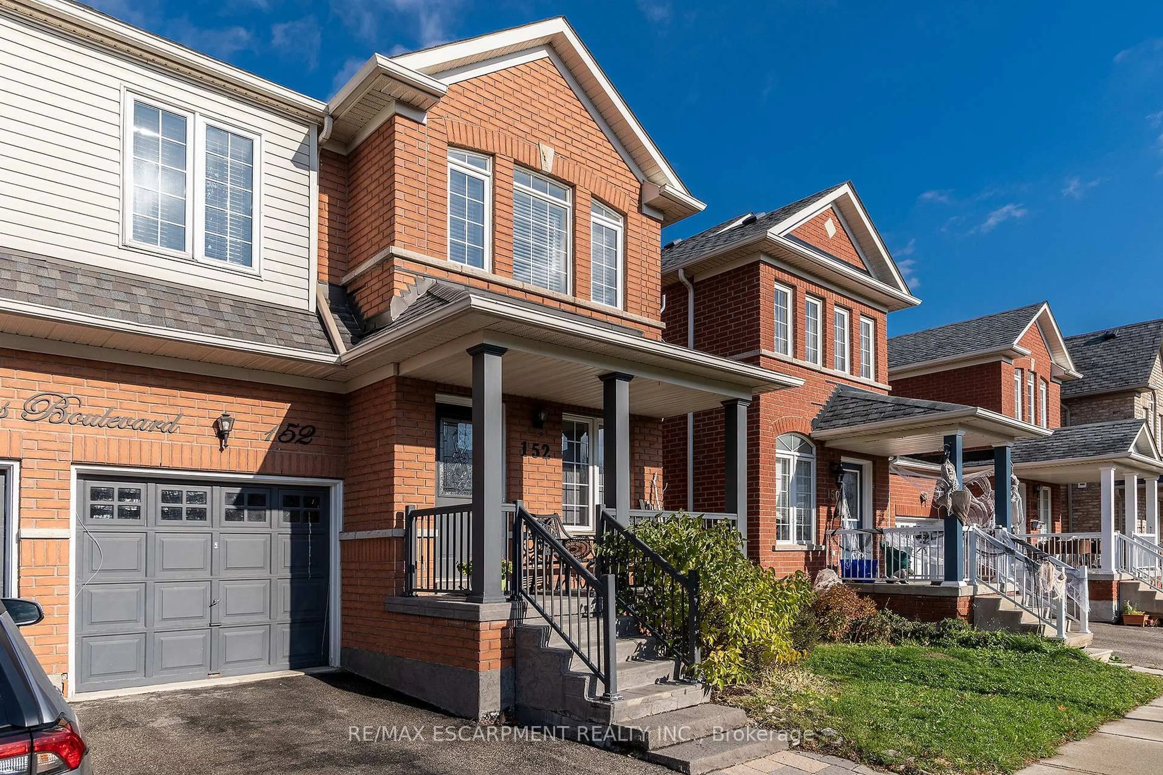 Home with brick exterior material, street for 152 Waters Blvd, Milton Ontario L9T 6K5