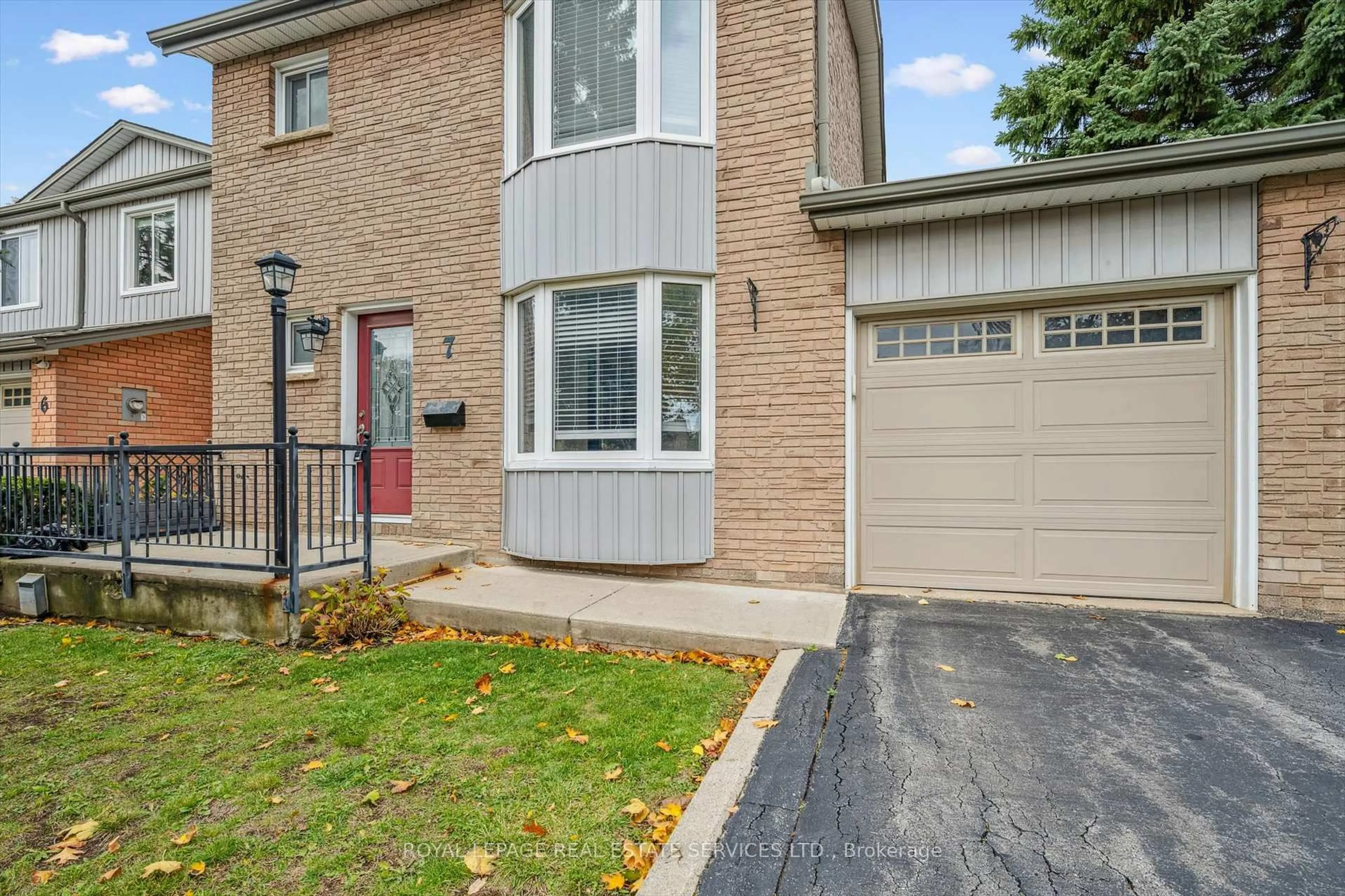 Home with brick exterior material, street for 1241 McCraney St #7, Oakville Ontario L6H 3A3