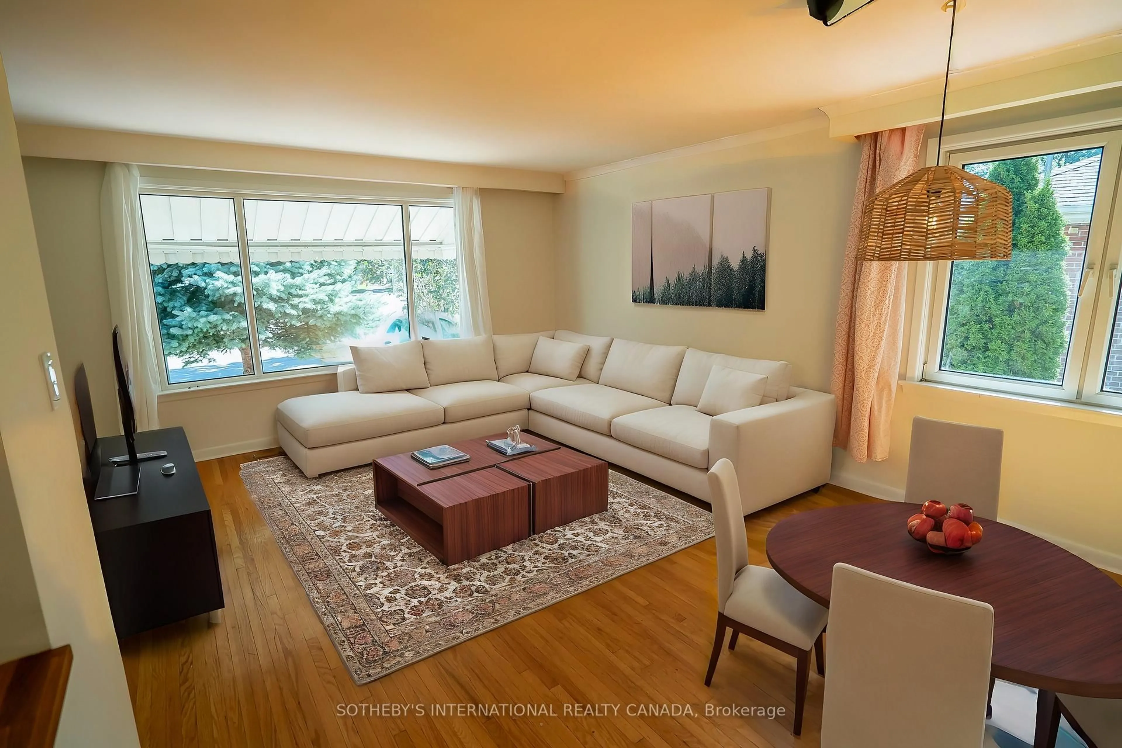Living room with furniture, wood/laminate floor for 11 Buckhorn Pl, Toronto Ontario M9V 2P3