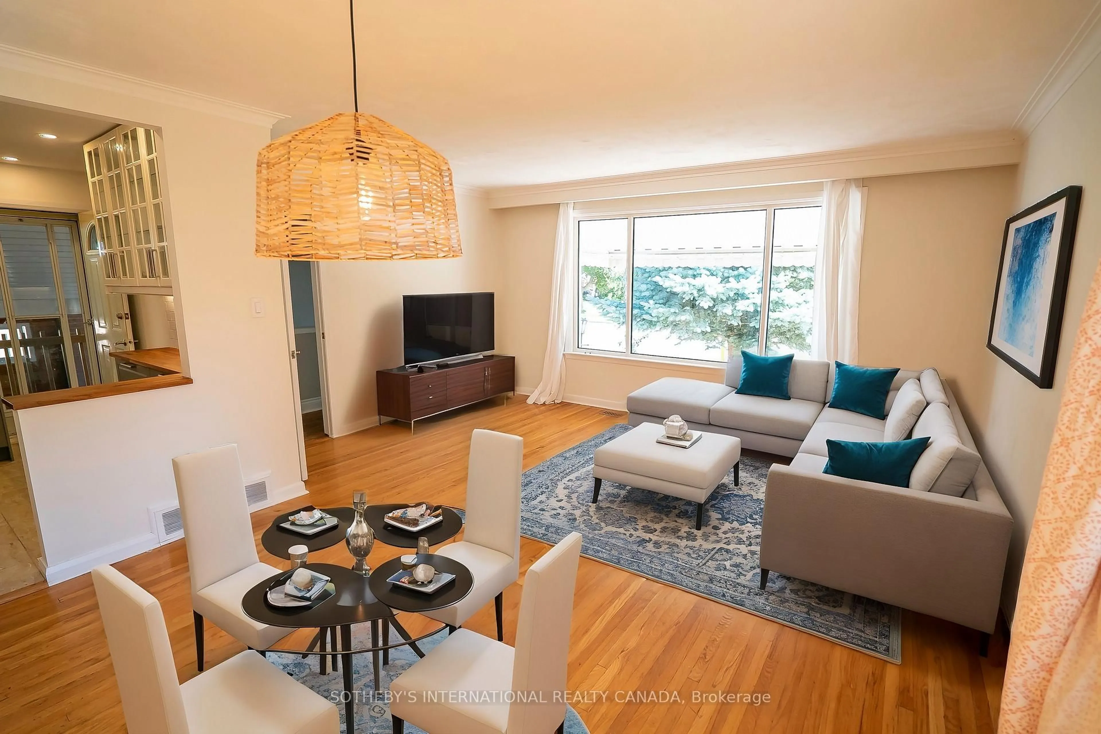 Living room with furniture, wood/laminate floor for 11 Buckhorn Pl, Toronto Ontario M9V 2P3