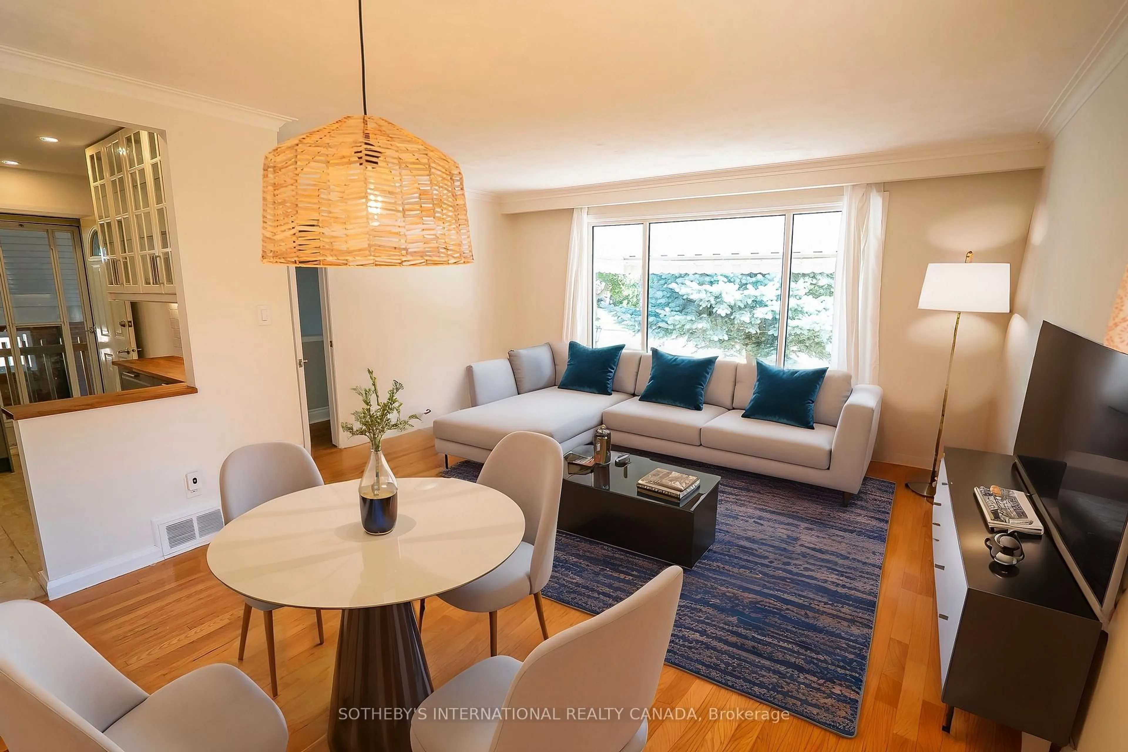 Living room with furniture, wood/laminate floor for 11 Buckhorn Pl, Toronto Ontario M9V 2P3