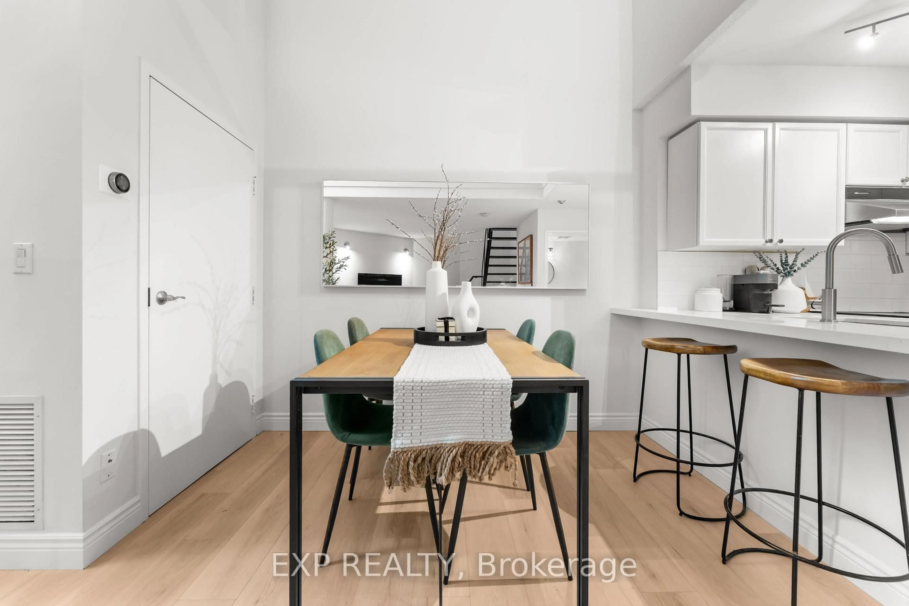 Dining room, wood/laminate floor for 250 Manitoba St #501, Toronto Ontario M8Y 4G8