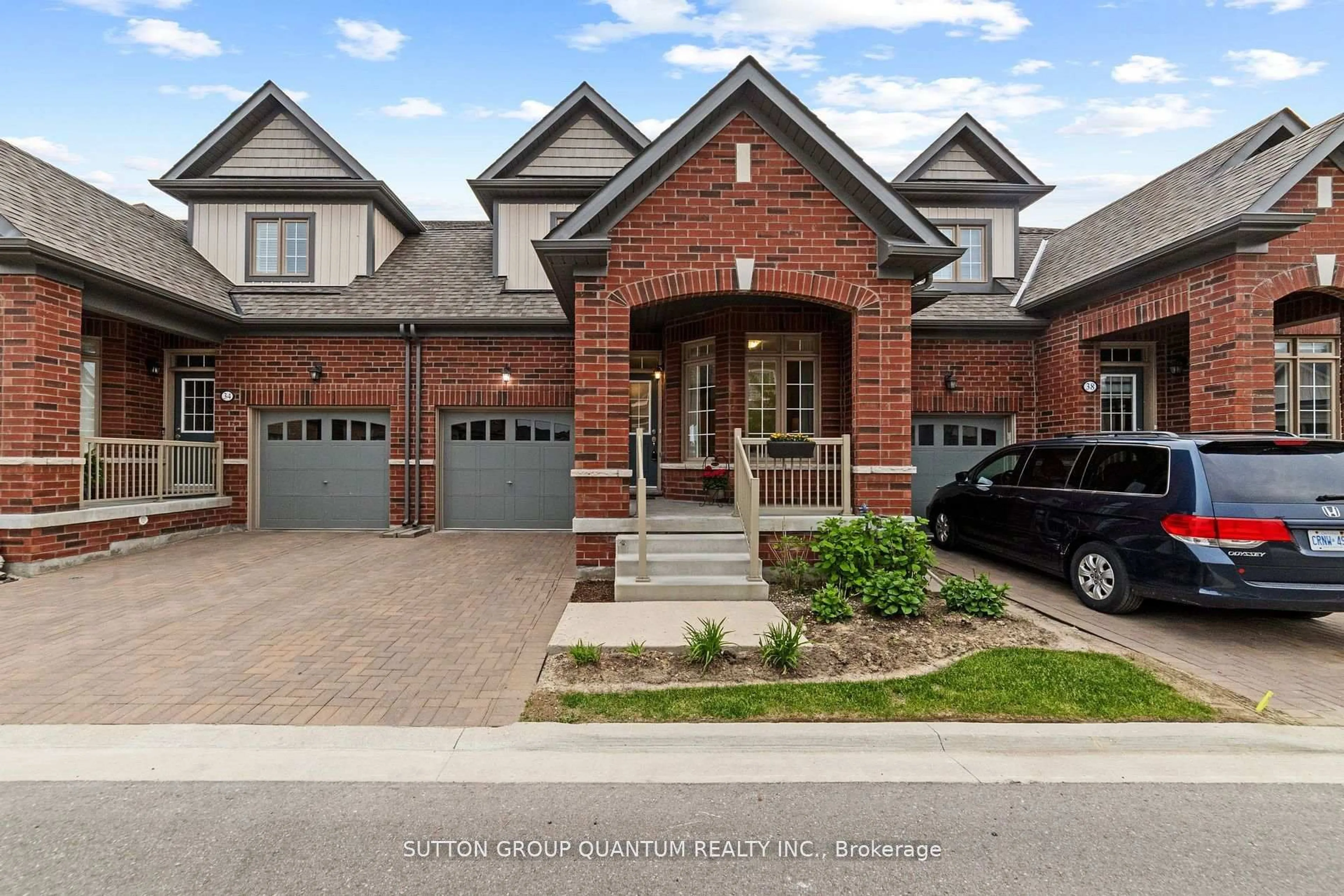 Home with brick exterior material, street for 36 Bluestone Cres, Brampton Ontario M5A 1E7