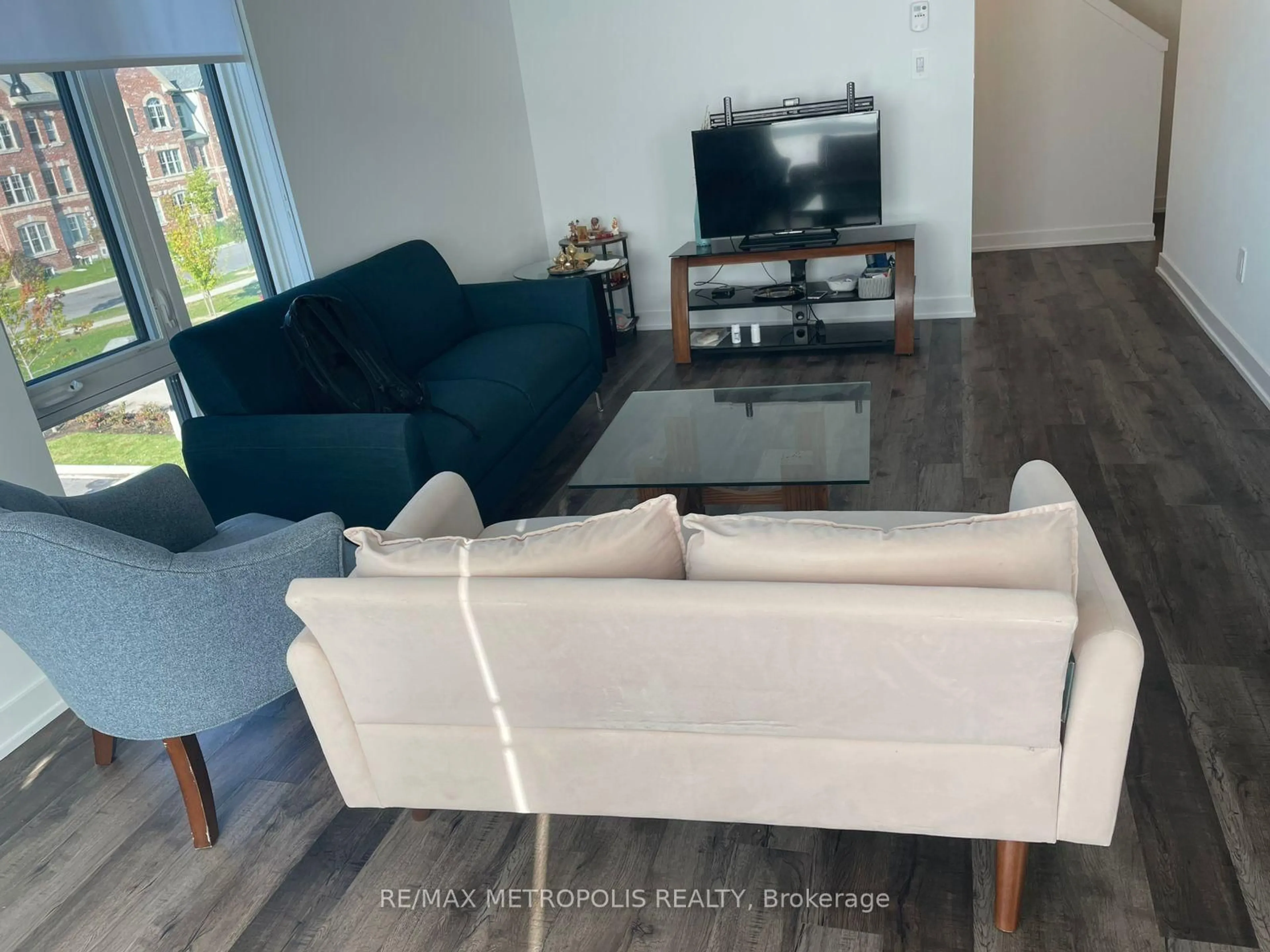 Living room with furniture, unknown for 55 Romilly Ave #23, Brampton Ontario L7A 5L8