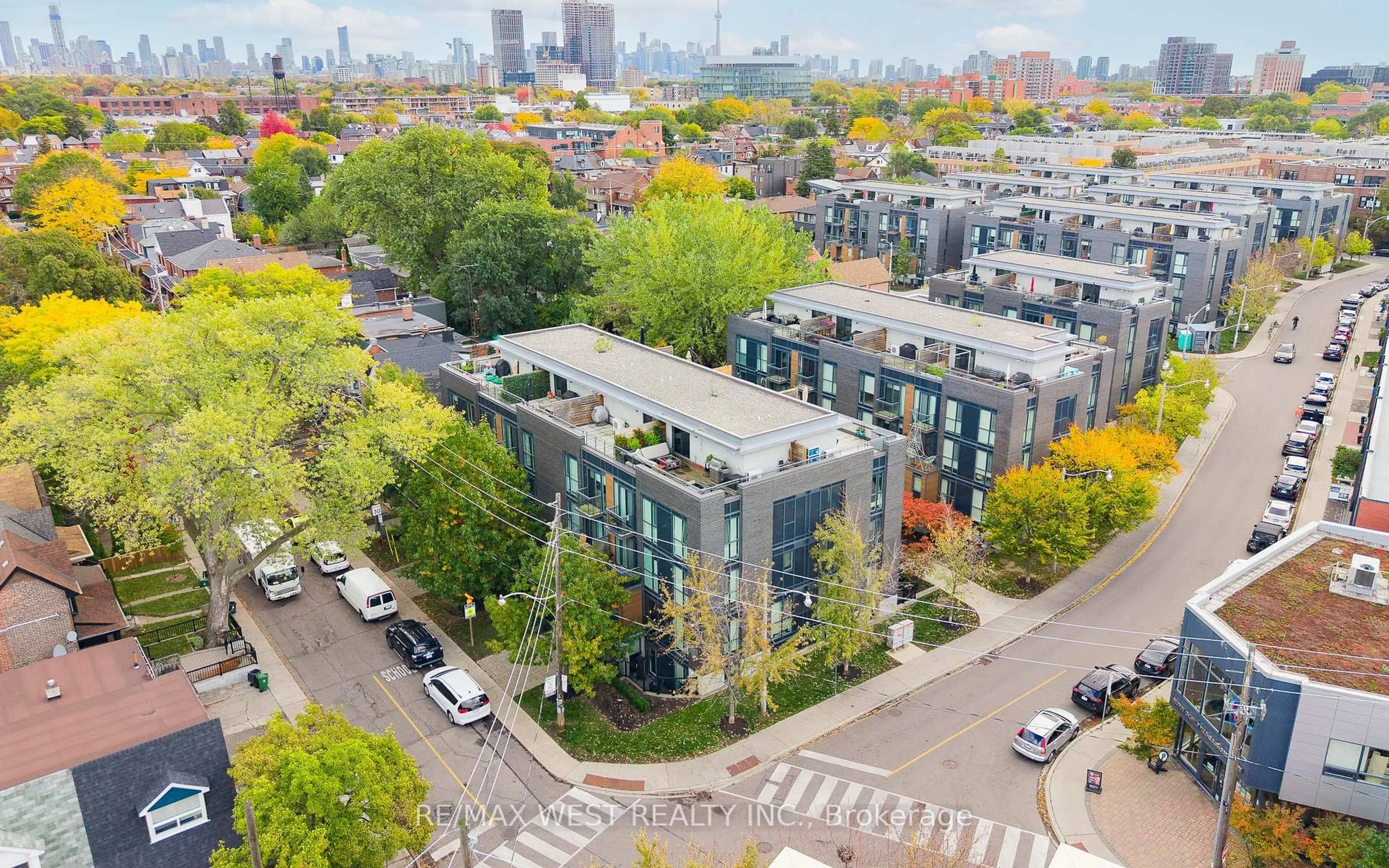 A pic from outside/outdoor area/front of a property/back of a property/a pic from drone, city buildings view from balcony for 63 Ruskin Ave #TH401, Toronto Ontario M6P 3P7