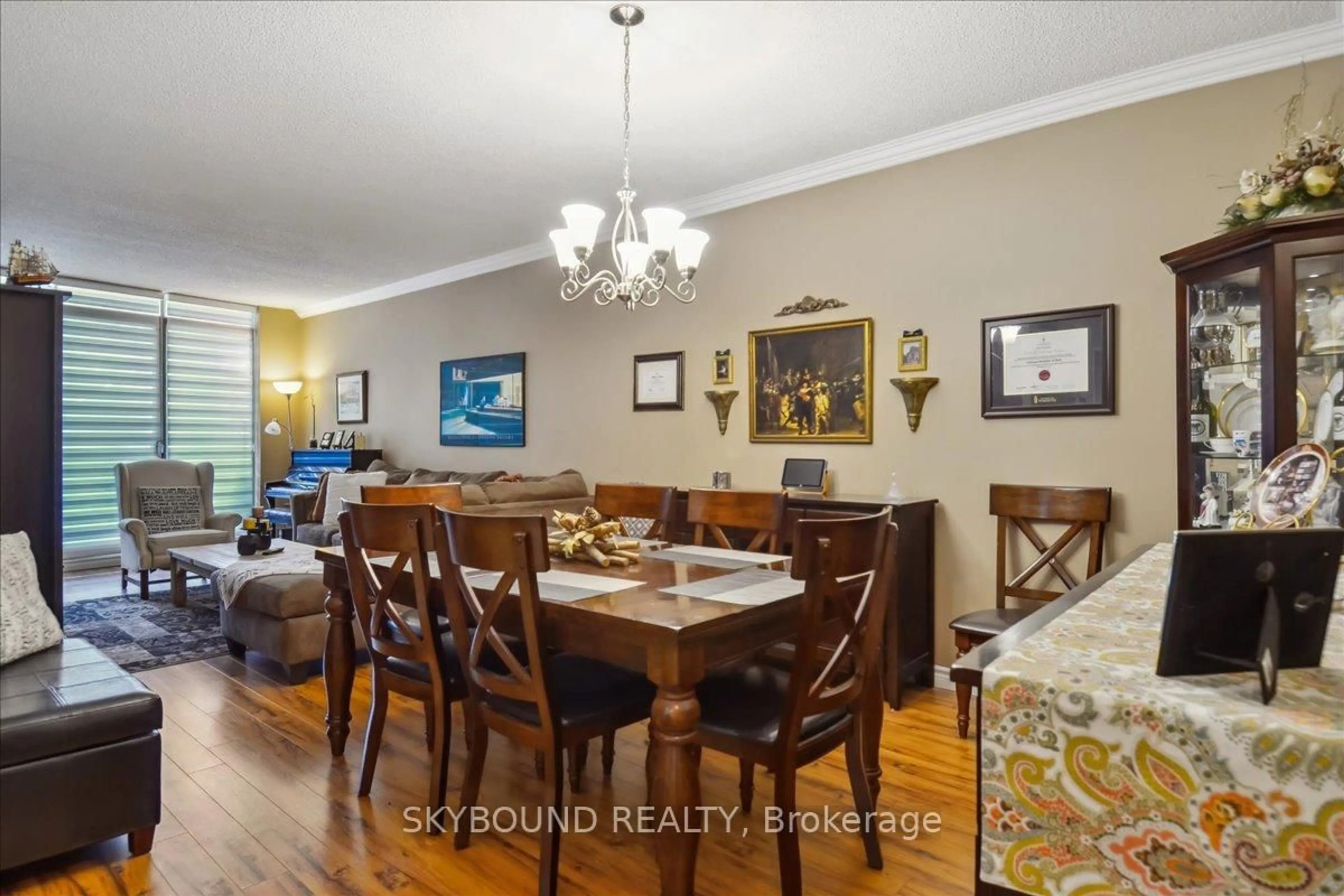 Dining room, wood/laminate floor for 299 Mill Rd #109, Toronto Ontario M9C 4V9