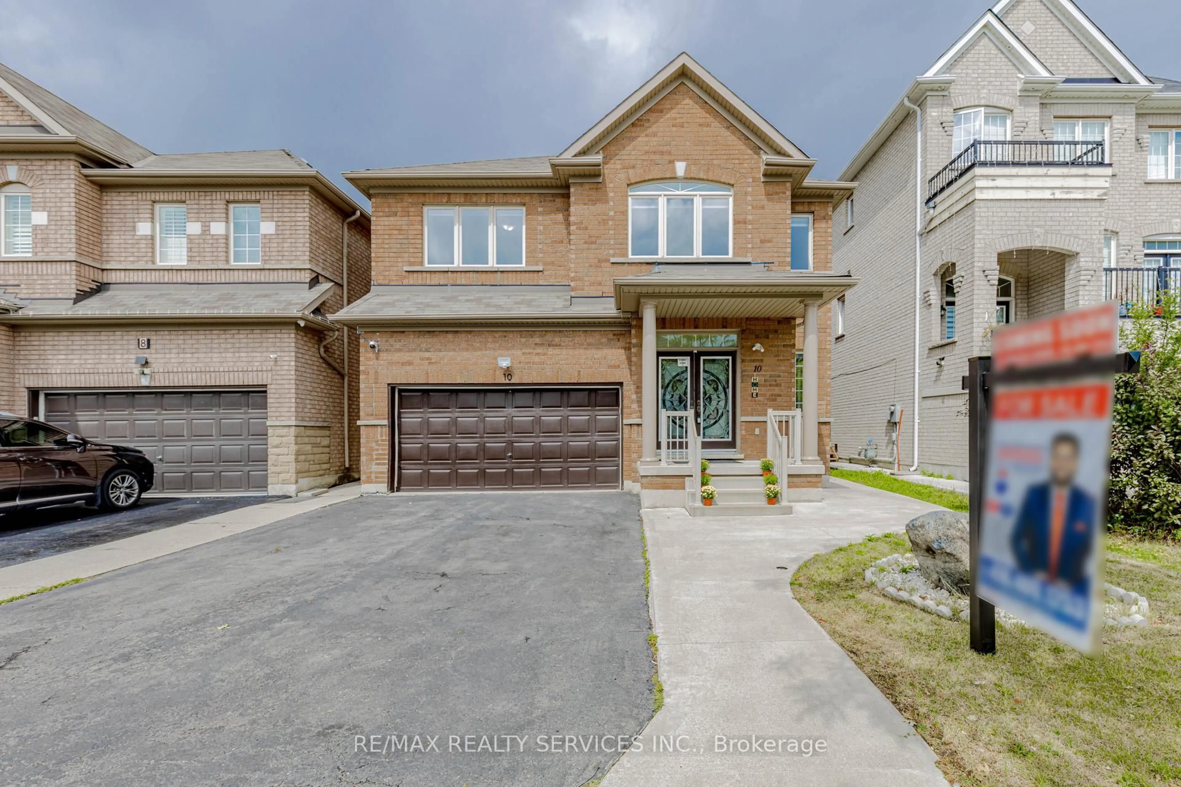 Home with brick exterior material, street for 10 Cedarsprings Way, Brampton Ontario L6R 0W1