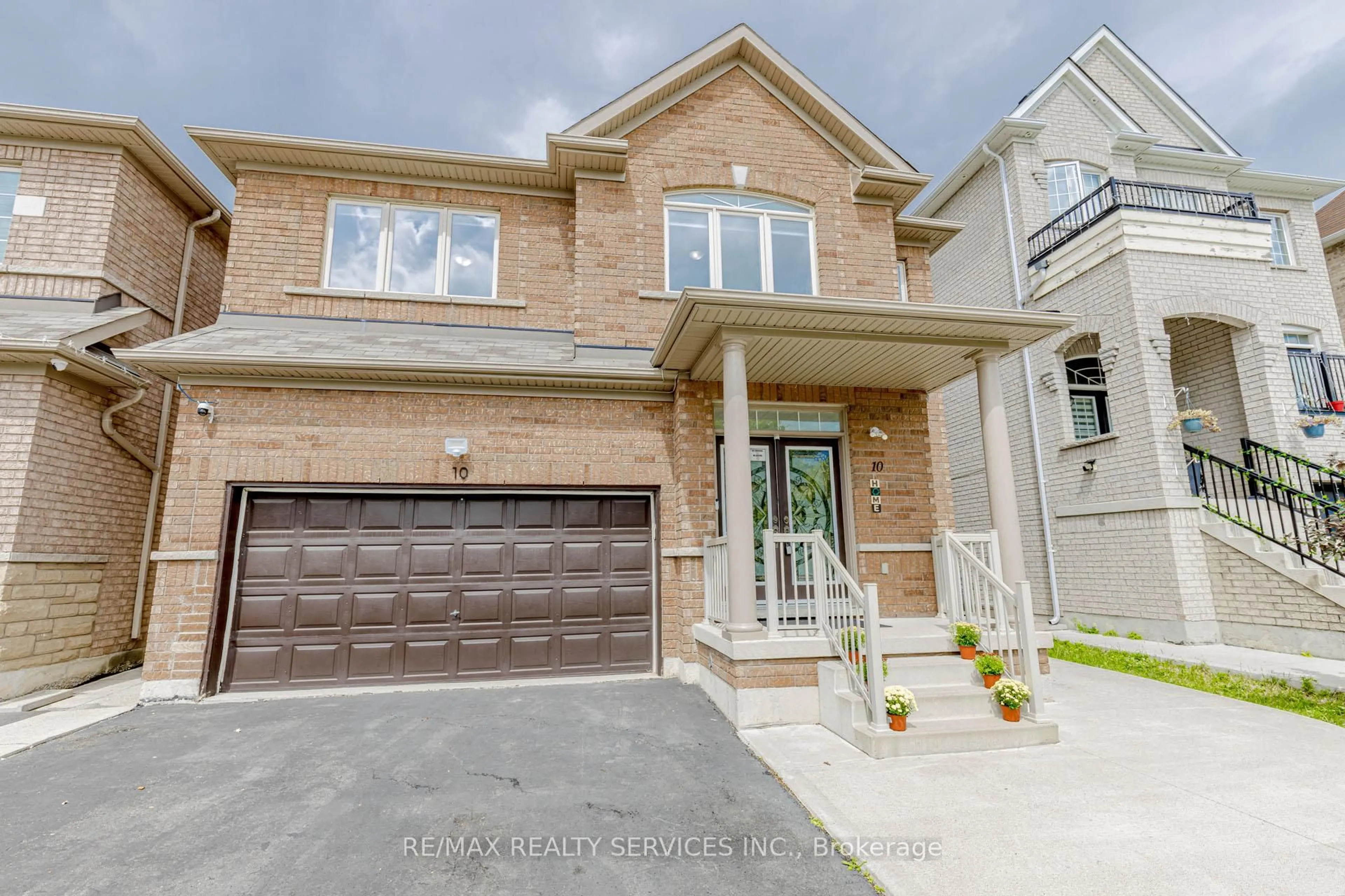 Home with brick exterior material, street for 10 Cedarsprings Way, Brampton Ontario L6R 0W1