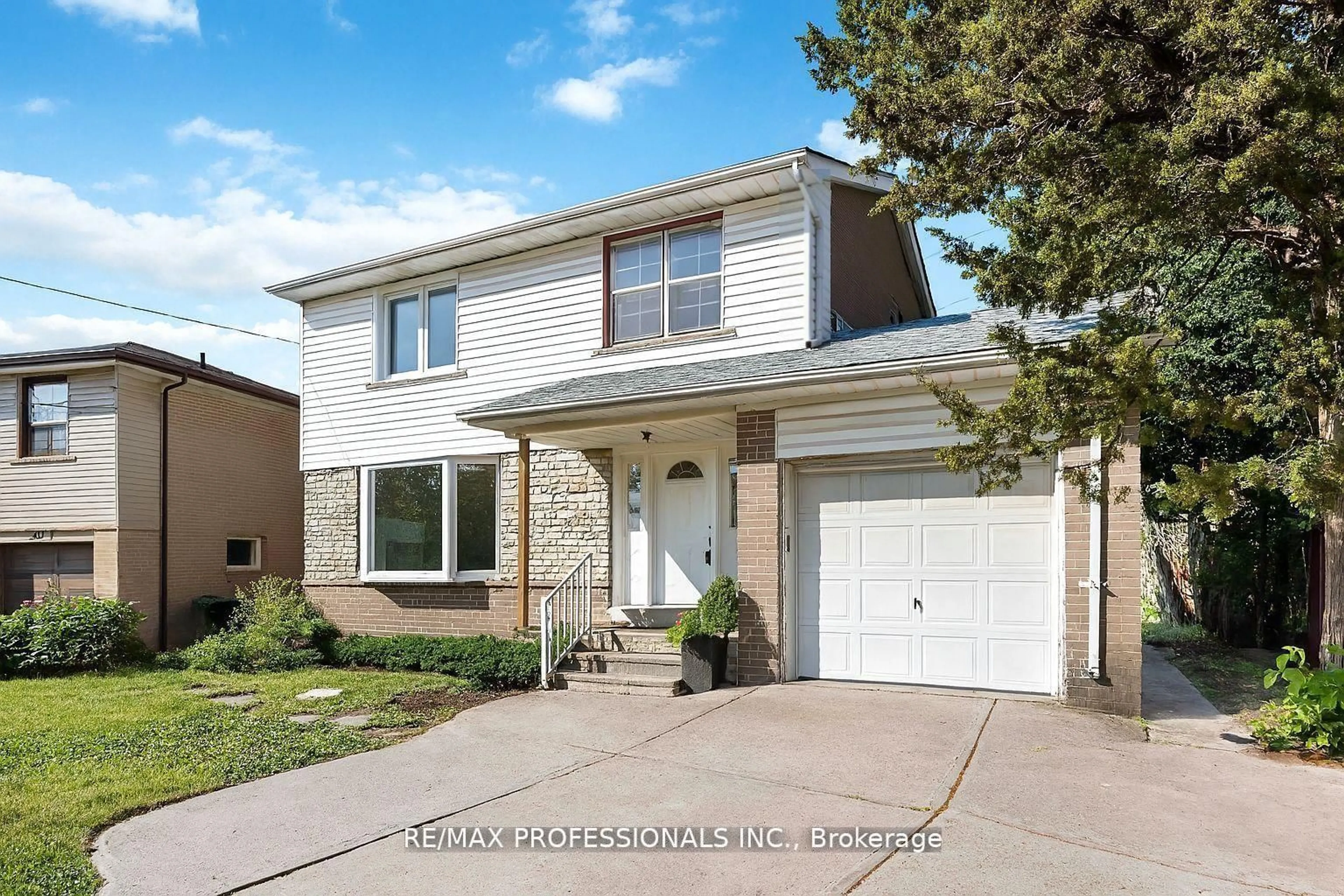 Home with vinyl exterior material, street for 275 Jeffcoat Dr, Toronto Ontario M9W 3E4