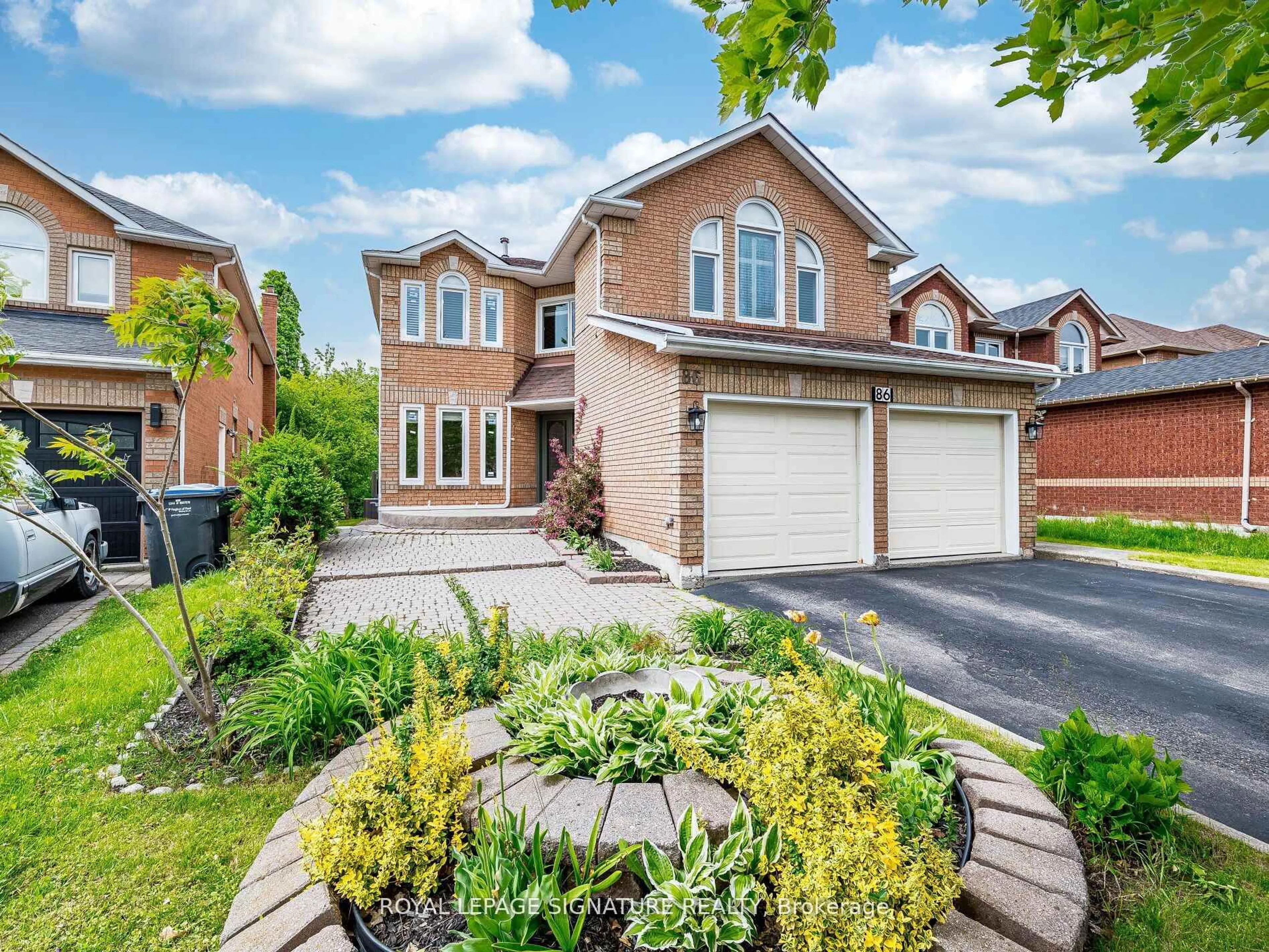 Home with brick exterior material, street for 86 Valonia Dr, Brampton Ontario L6V 4K1