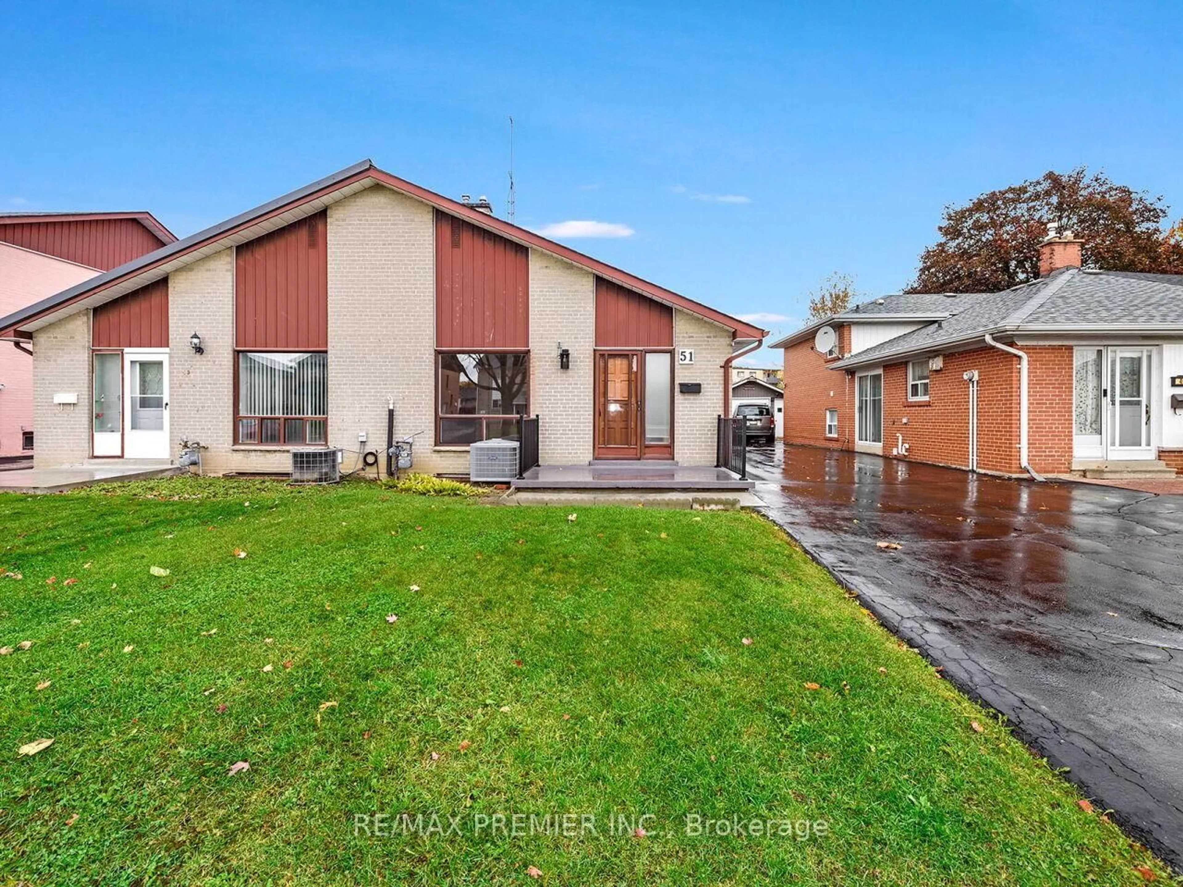 A pic from outside/outdoor area/front of a property/back of a property/a pic from drone, street for 51 Radwinter Dr, Toronto Ontario M9V 1P7