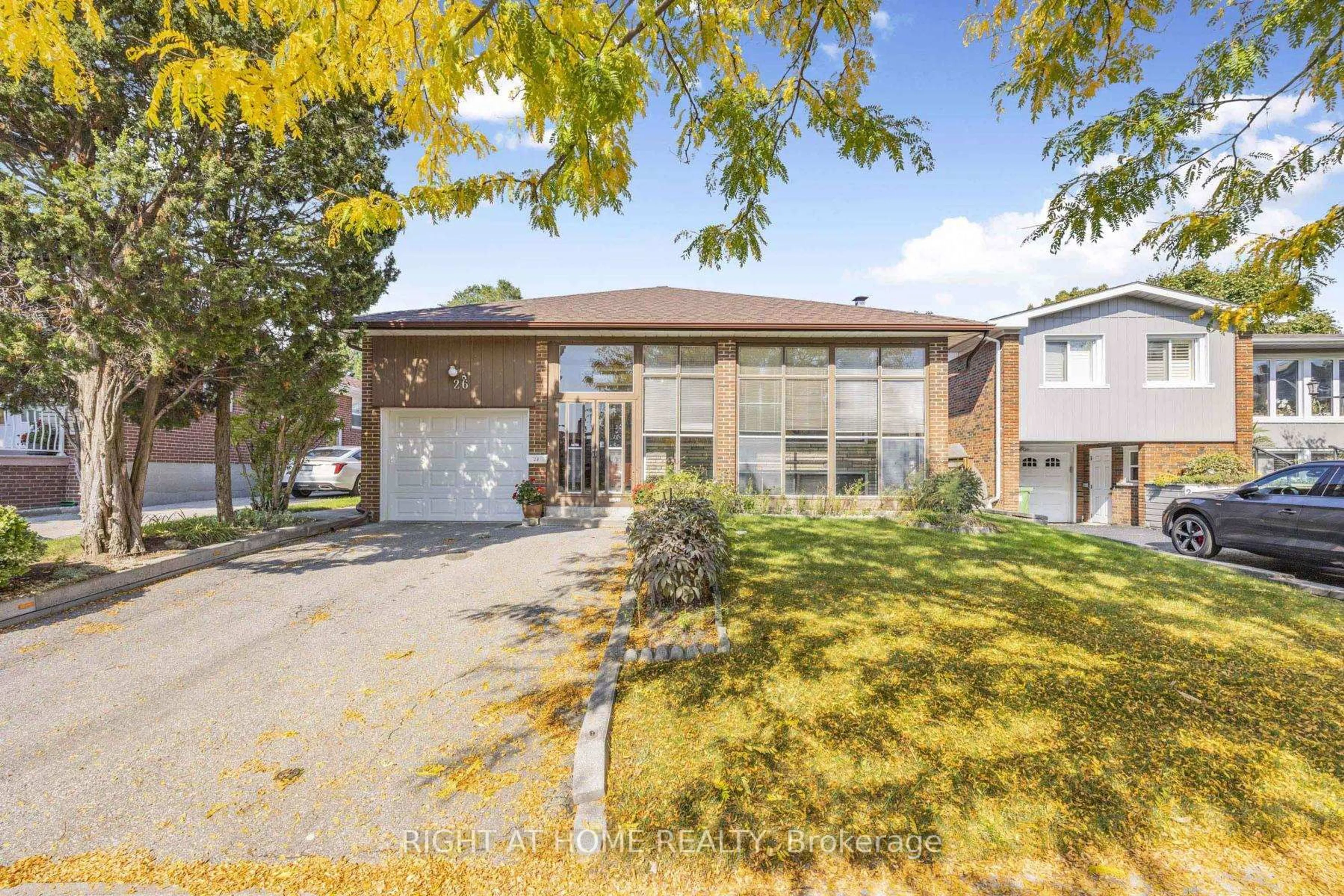 Home with brick exterior material, street for 26 Dixfield Dr, Toronto Ontario M9C 4J1