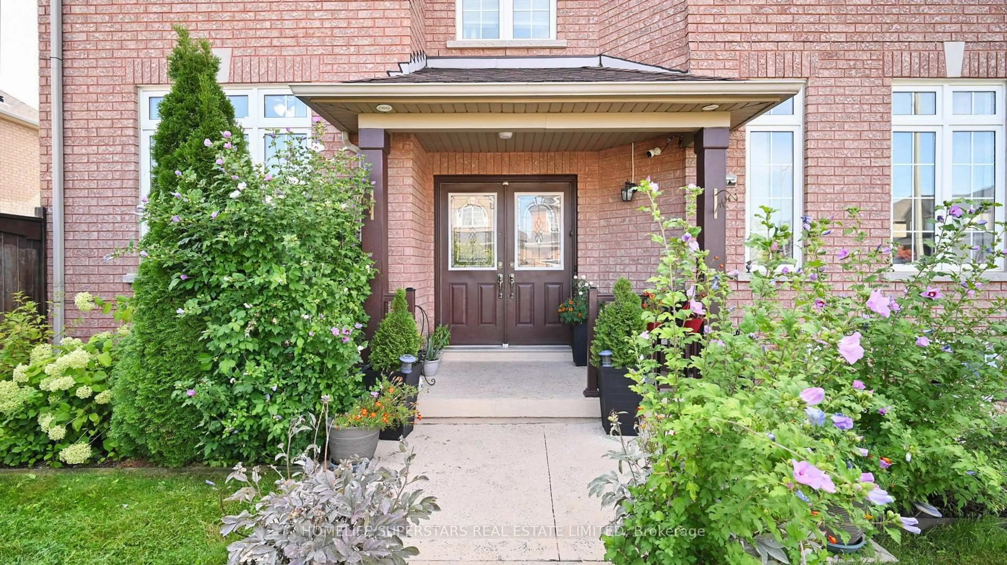 Home with brick exterior material, street for 57 Quailvalley Dr, Brampton Ontario L6R 0N7