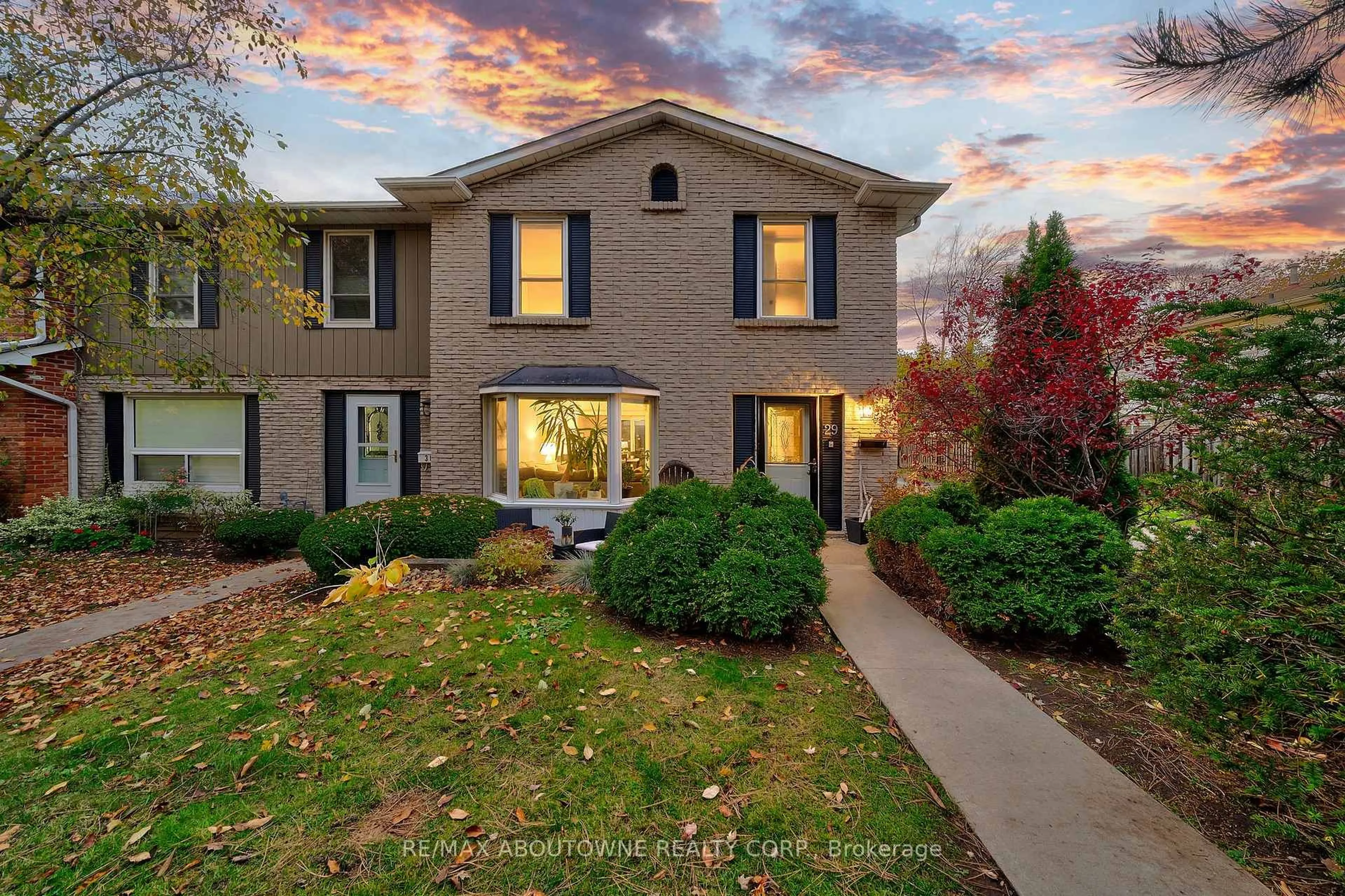 Home with brick exterior material, street for 5475 Lakeshore Rd #29, Burlington Ontario L7L 1E1