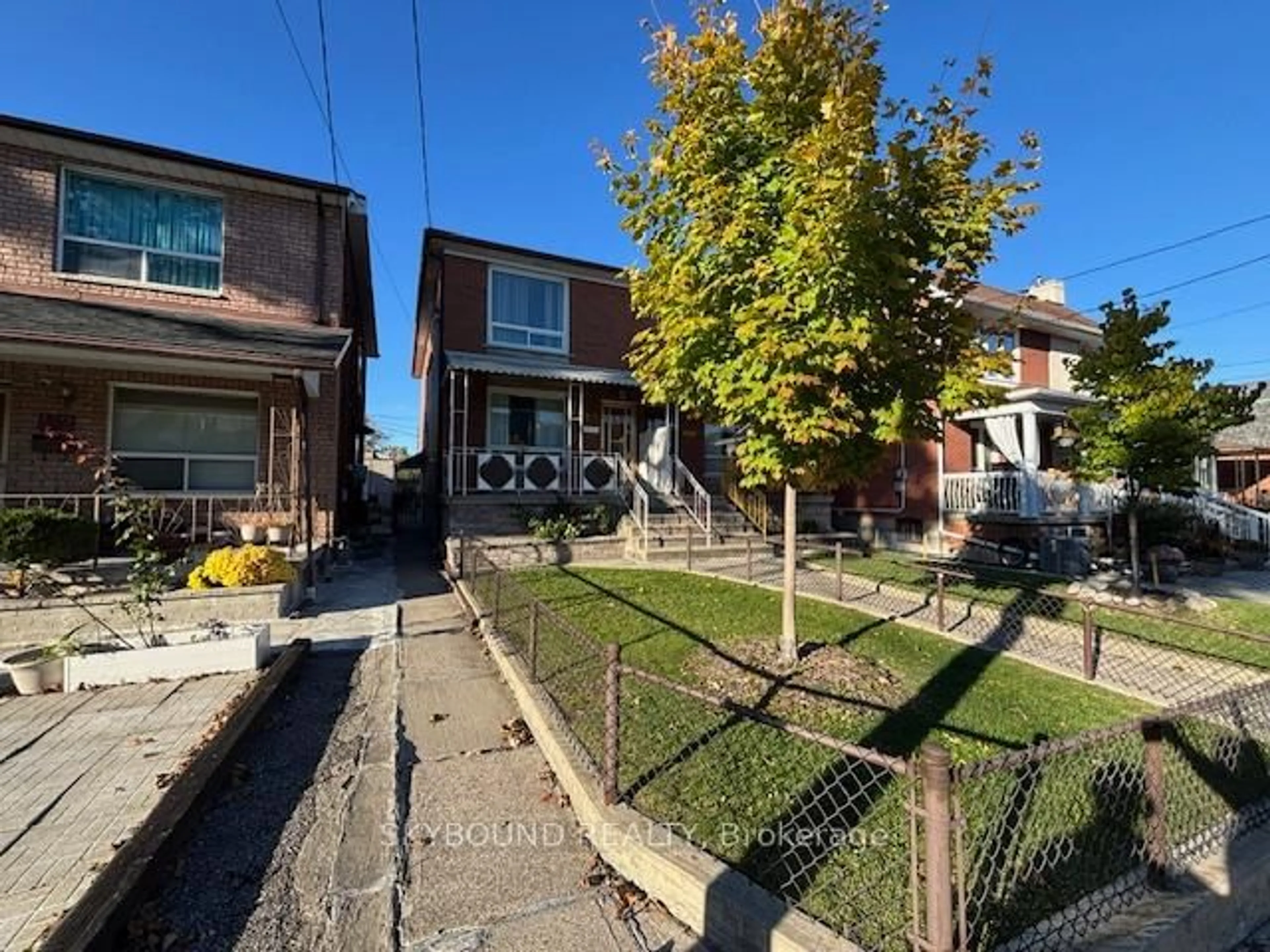 A pic from outside/outdoor area/front of a property/back of a property/a pic from drone, street for 110A Morrison Ave, Toronto Ontario M6E 1M2