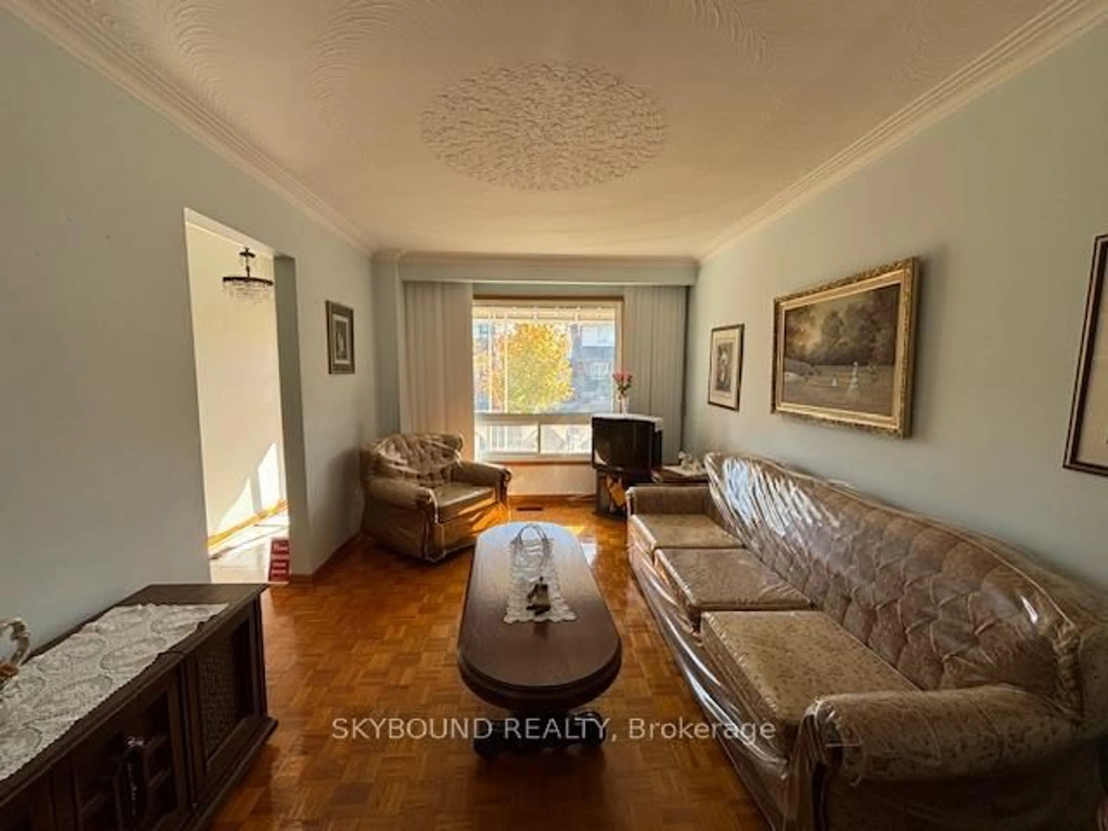 Living room with furniture, unknown for 110A Morrison Ave, Toronto Ontario M6E 1M2