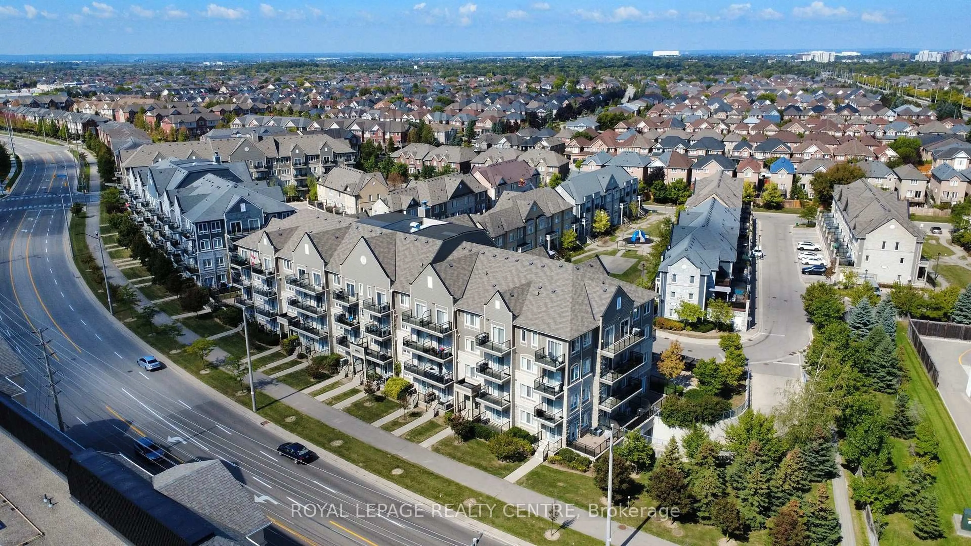 A pic from outside/outdoor area/front of a property/back of a property/a pic from drone, city buildings view from balcony for 3055 Thomas St #113, Mississauga Ontario L5M 0M4