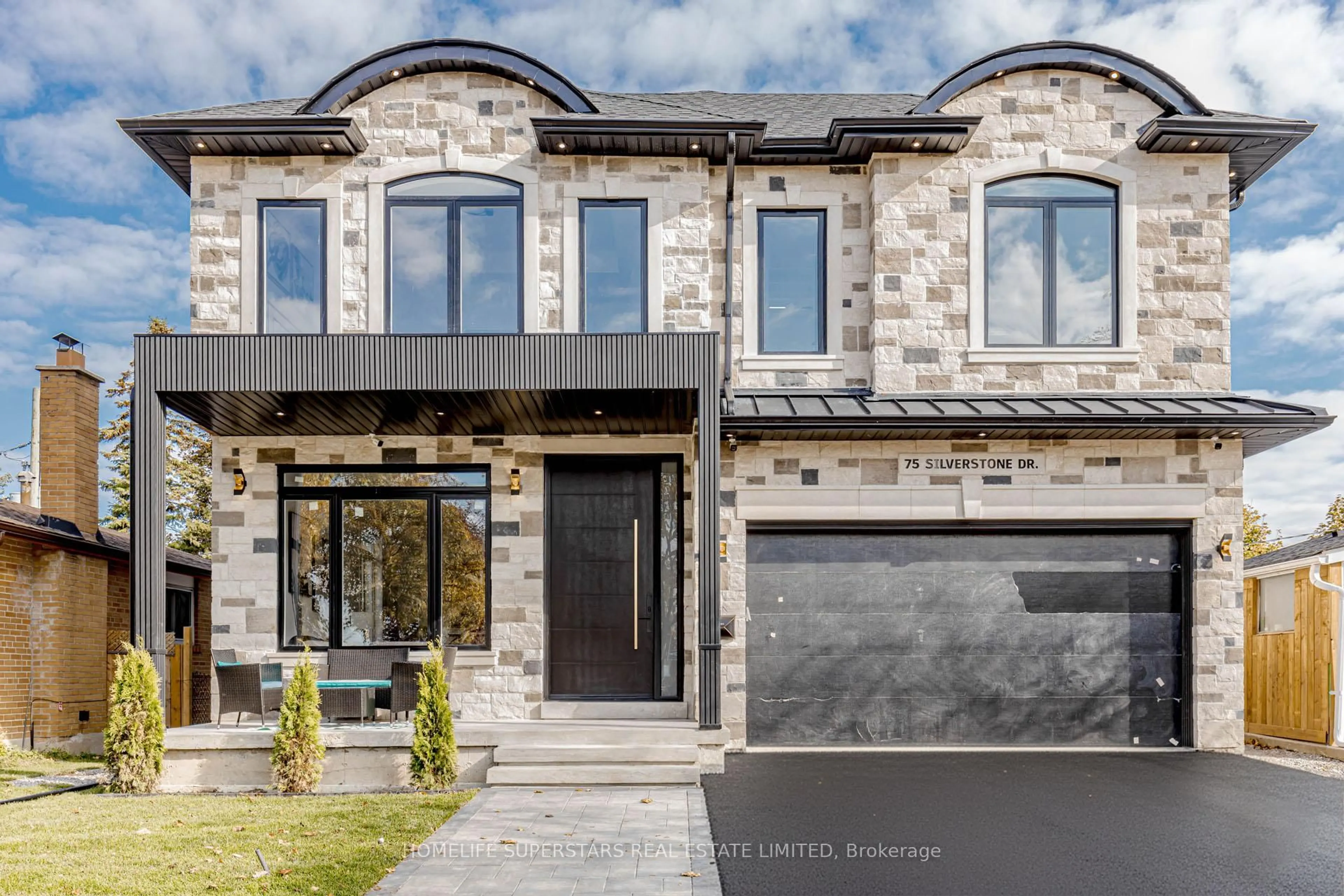 Home with brick exterior material, street for 75 Silverstone Dr, Toronto Ontario M9V 3G4
