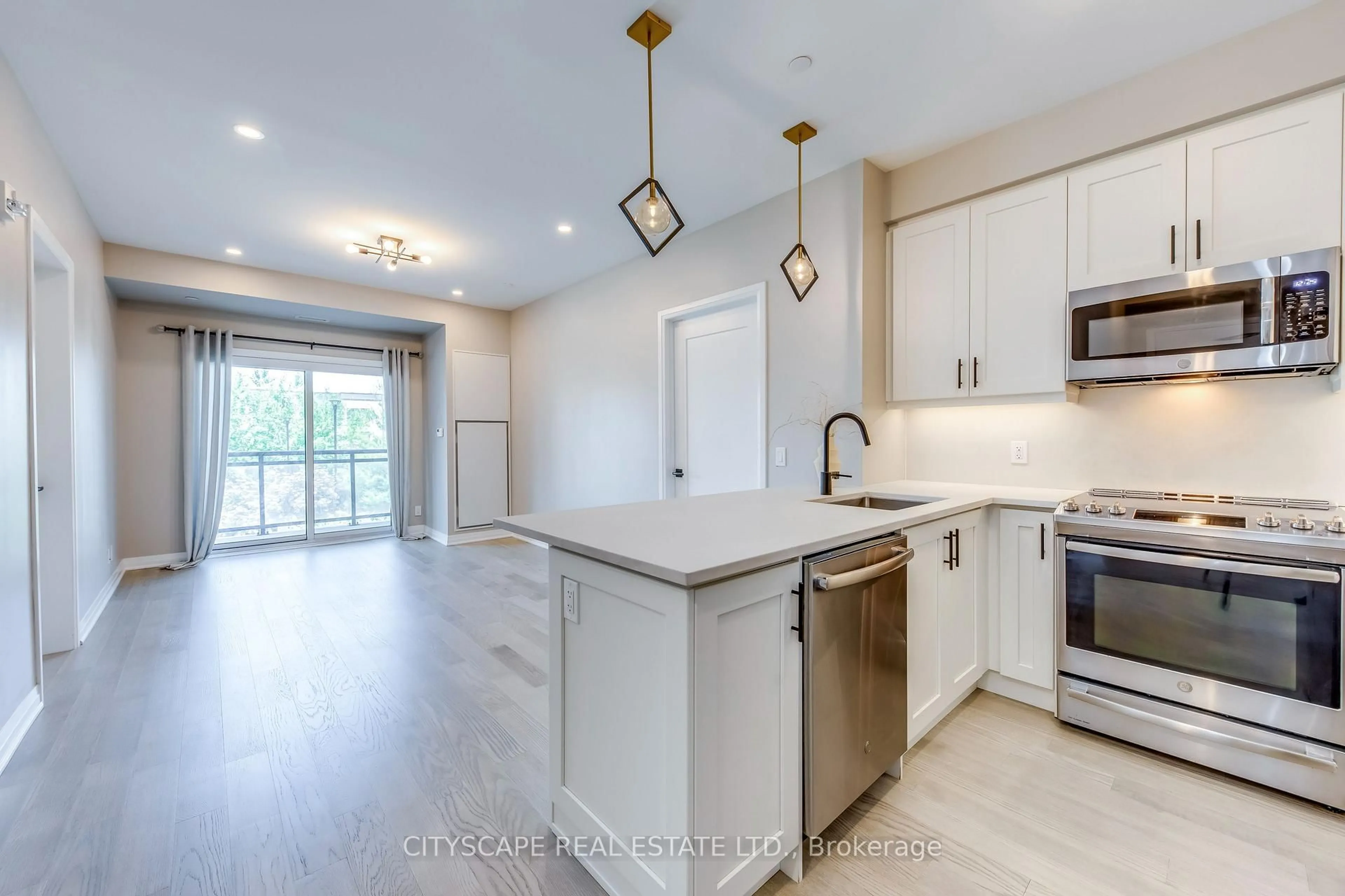 Open concept kitchen, ceramic/tile floor for 128 Grovewood Common #205, Oakville Ontario L6H 0X3
