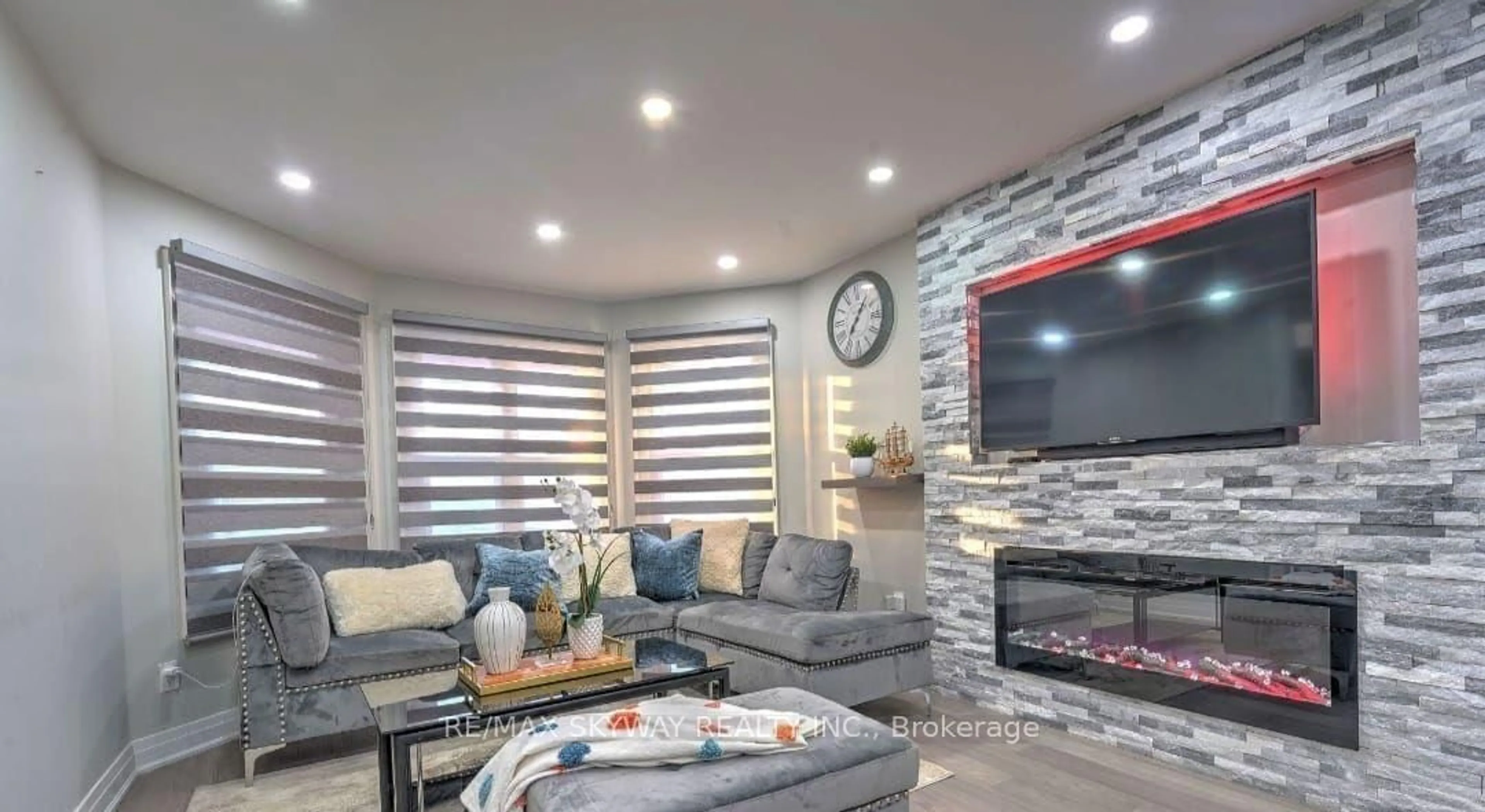 Living room with furniture, ceramic/tile floor for 104 Torrance Wood, Brampton Ontario L6Y 4L4