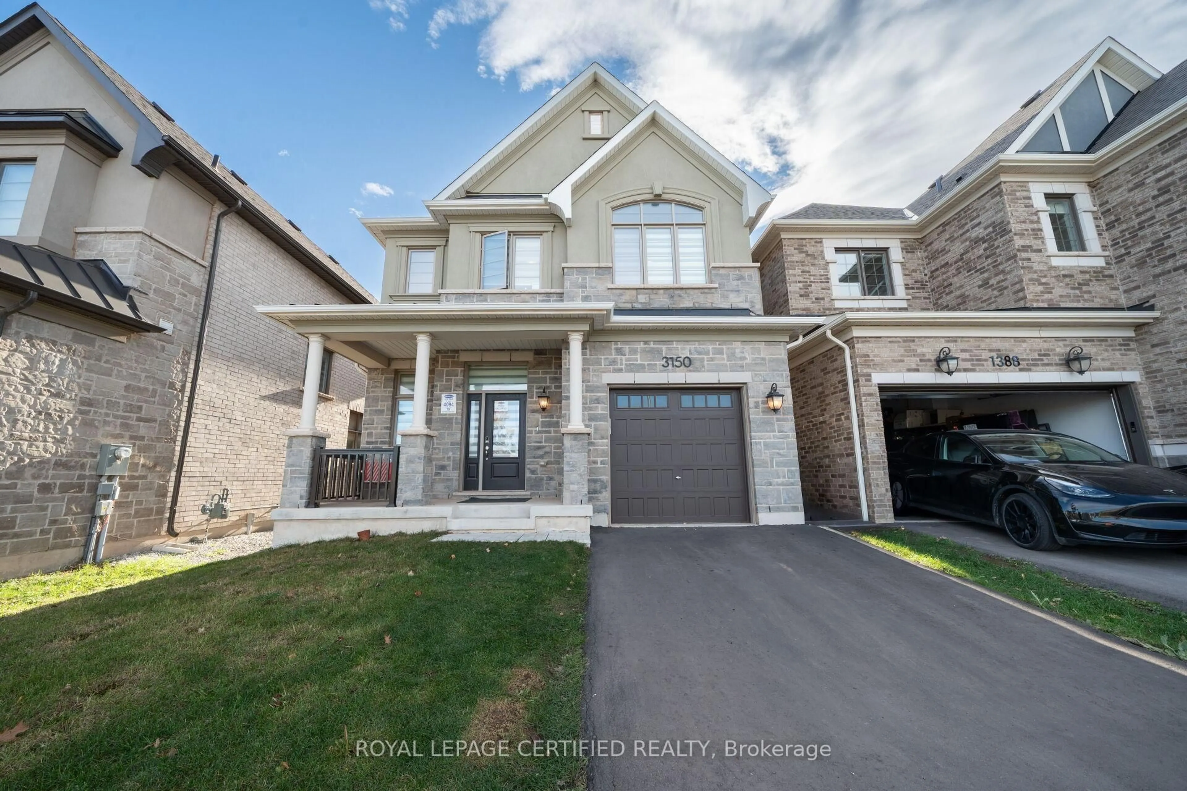 Home with brick exterior material, street for 3150 Williamcutmore Blvd, Oakville Ontario L6H 7X2