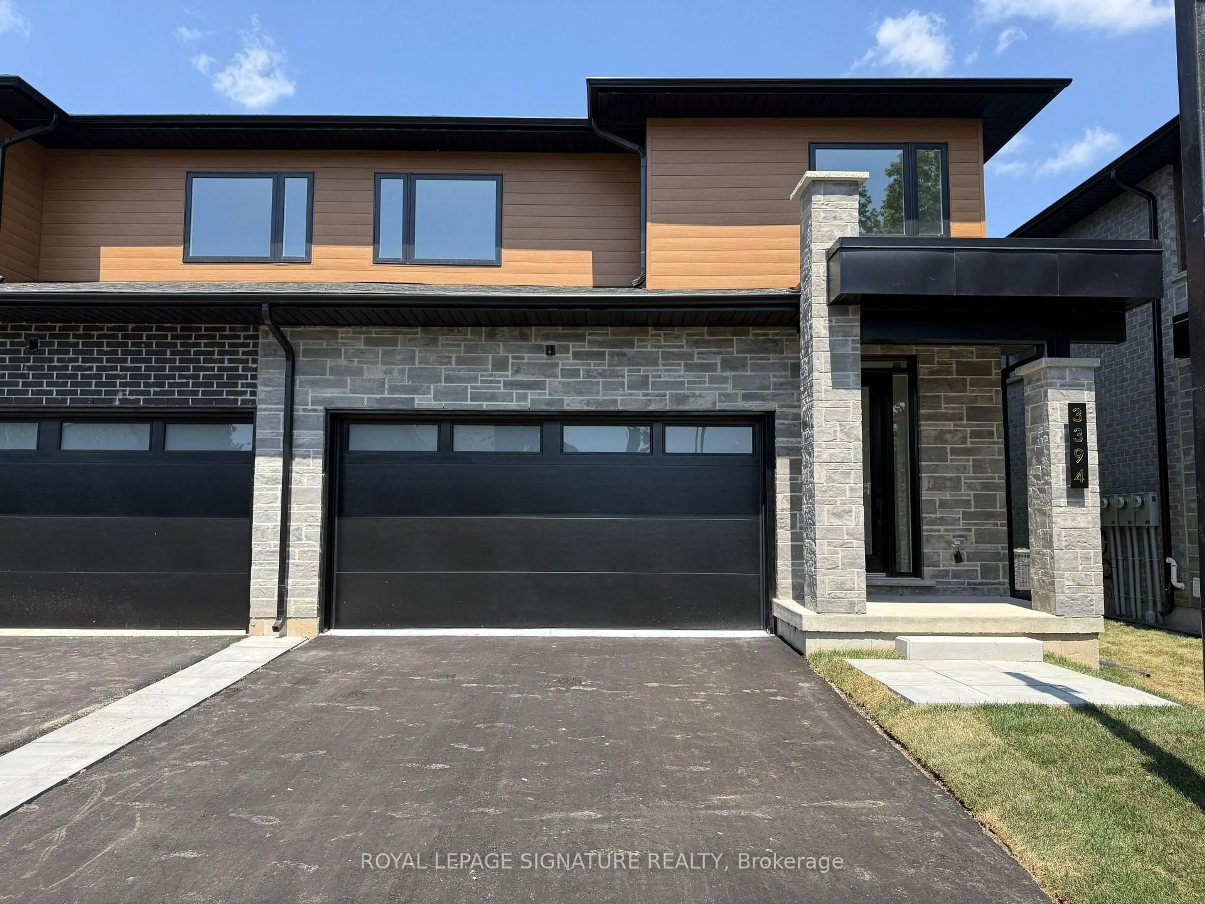 Home with brick exterior material, street for 3392 Carter Common #5, Burlington Ontario L7M 3R9