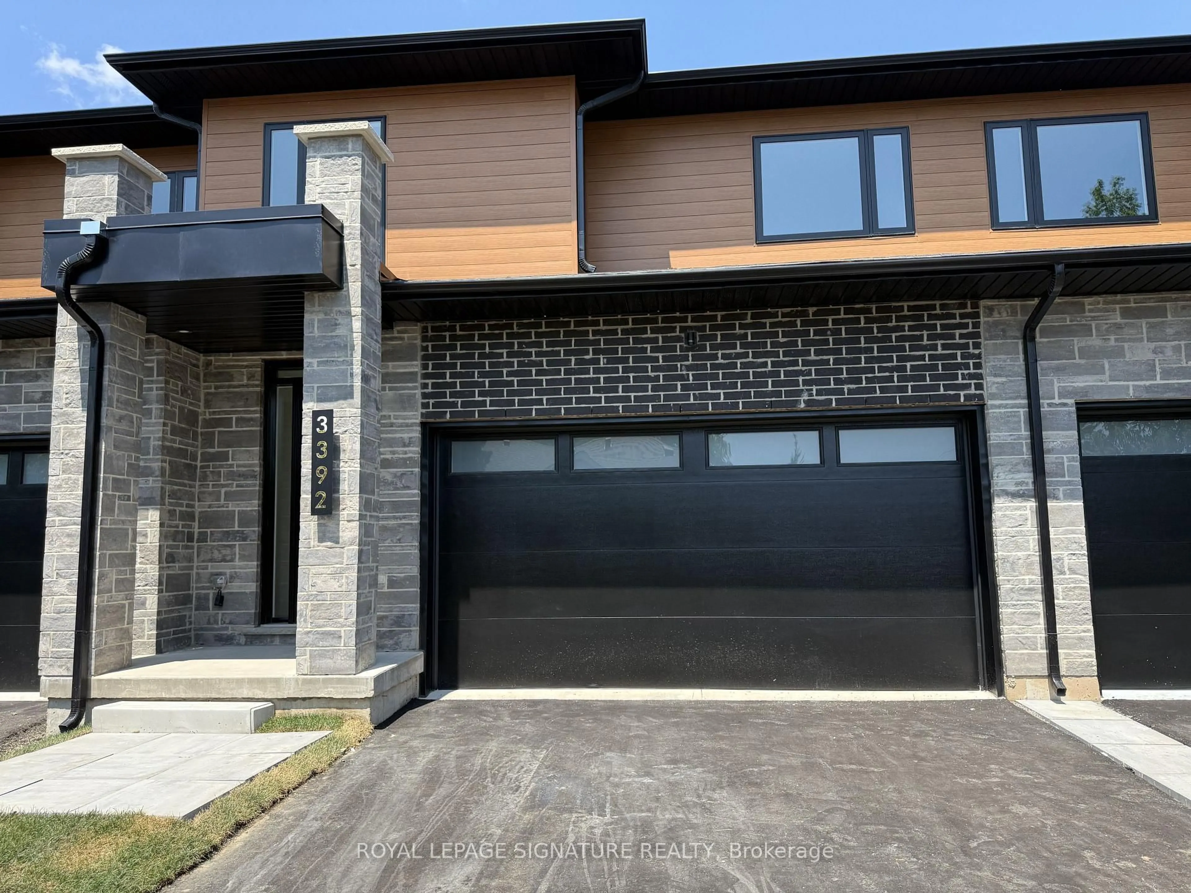 Home with brick exterior material, street for 3392 Carter Common #5, Burlington Ontario L7M 3R9