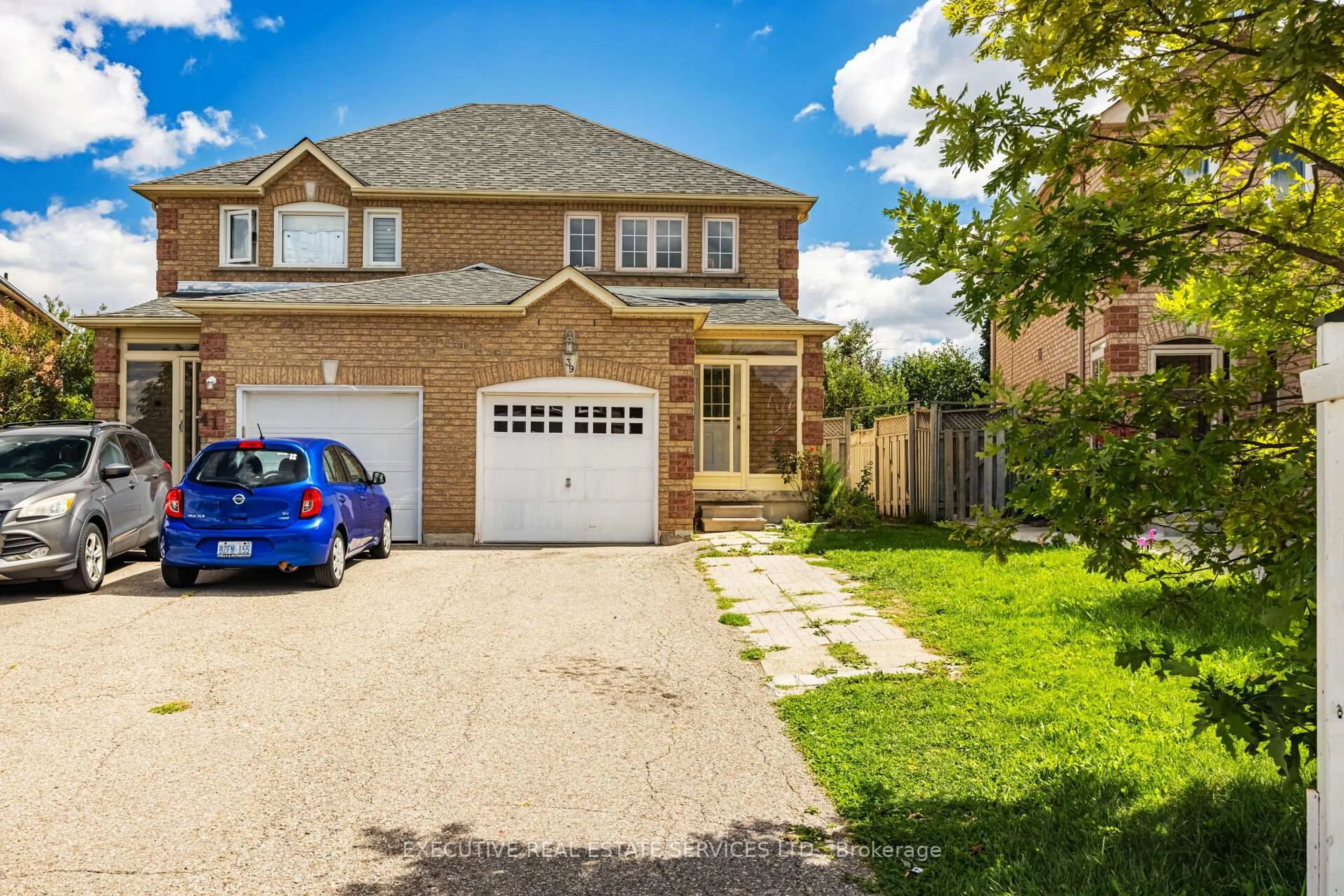 Home with brick exterior material, street for 39 Caruso Dr, Brampton Ontario L6Y 5B2