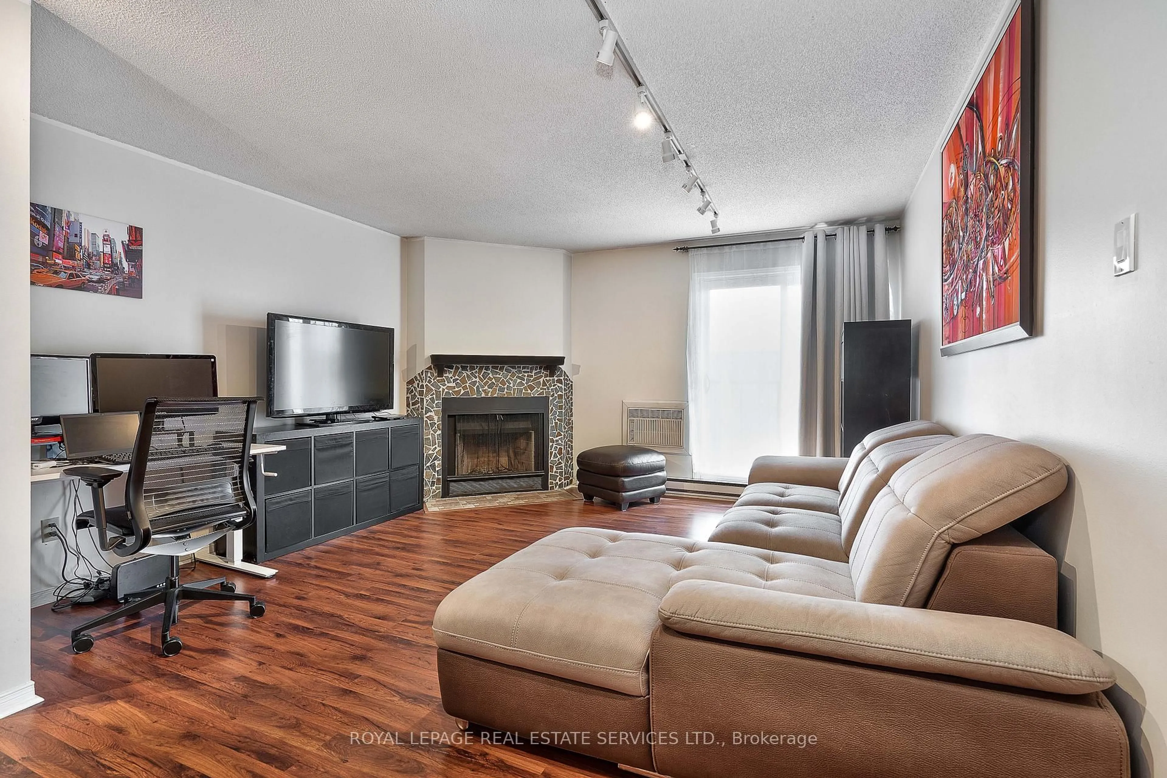 Living room with furniture, wood/laminate floor for 1478 Pilgrims Way #1734, Oakville Ontario L6M 3G7