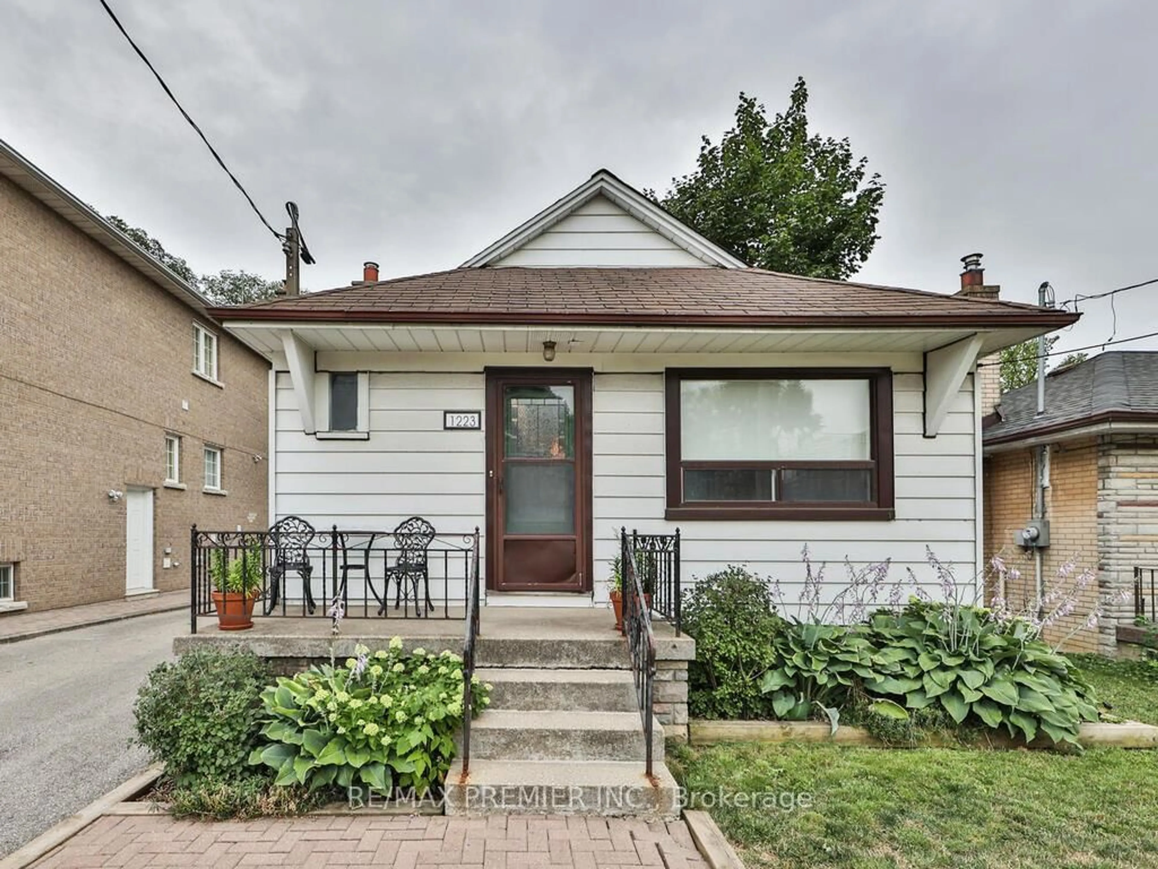Home with brick exterior material, street for 1223 Glencairn Ave, Toronto Ontario M6B 2B6