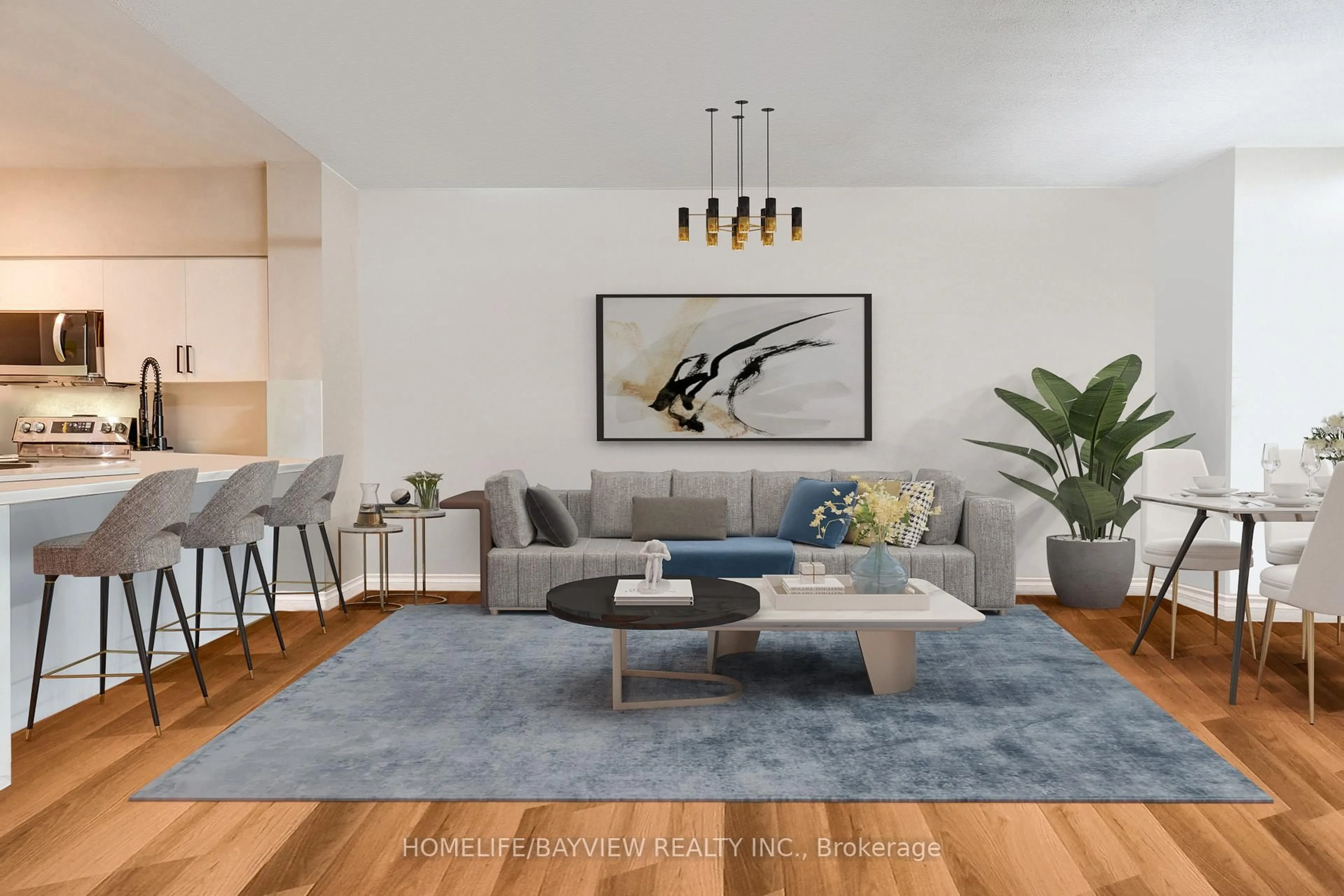 Living room with furniture, wood/laminate floor for 185 Legion Rd #315, Toronto Ontario M8Y 0A1