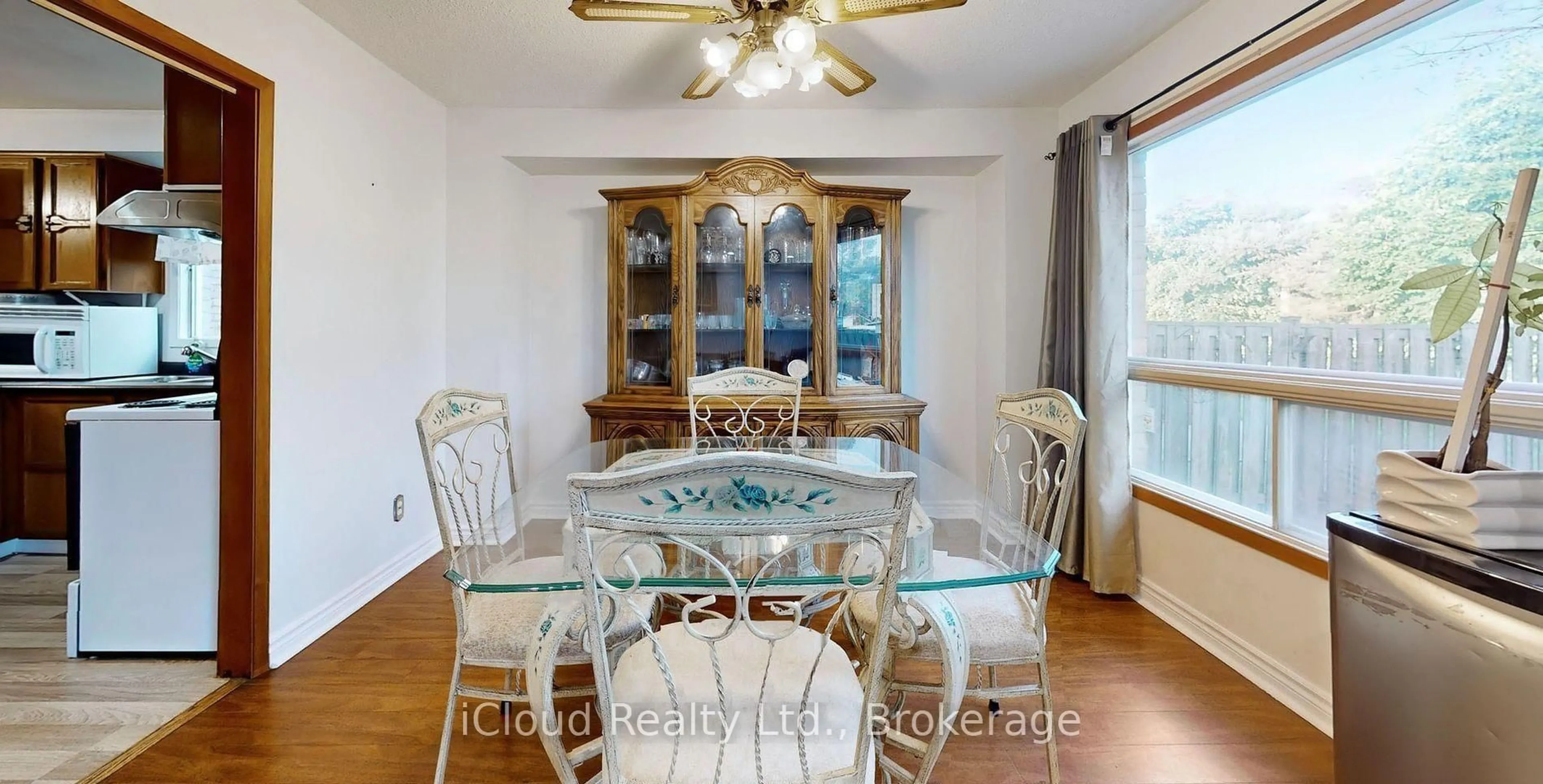 Dining room, wood/laminate floor for 32 Dafoe Cres, Brampton Ontario L6Y 2L2