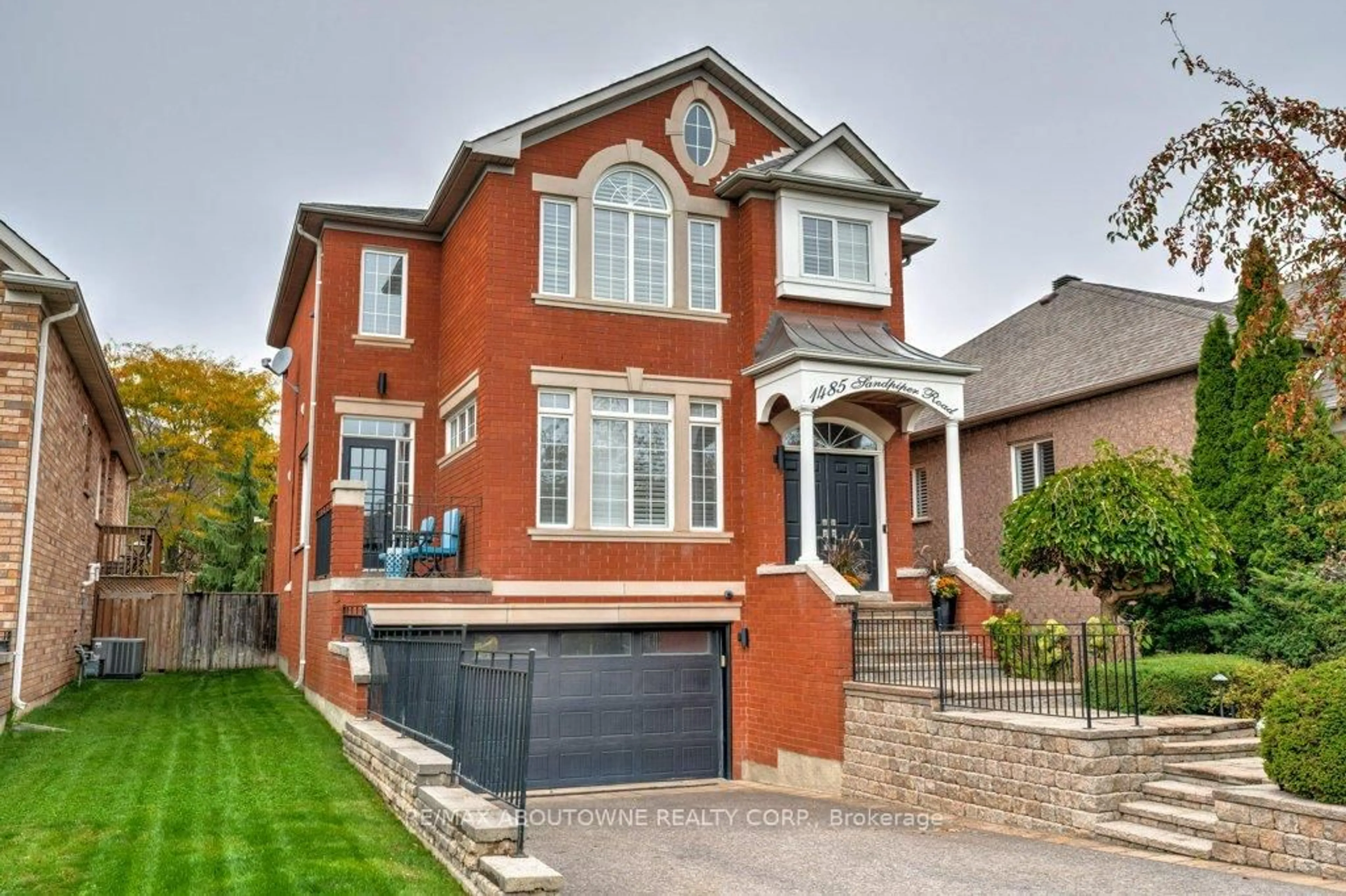 Home with brick exterior material, street for 1485 Sandpiper Rd, Oakville Ontario L6M 3R8